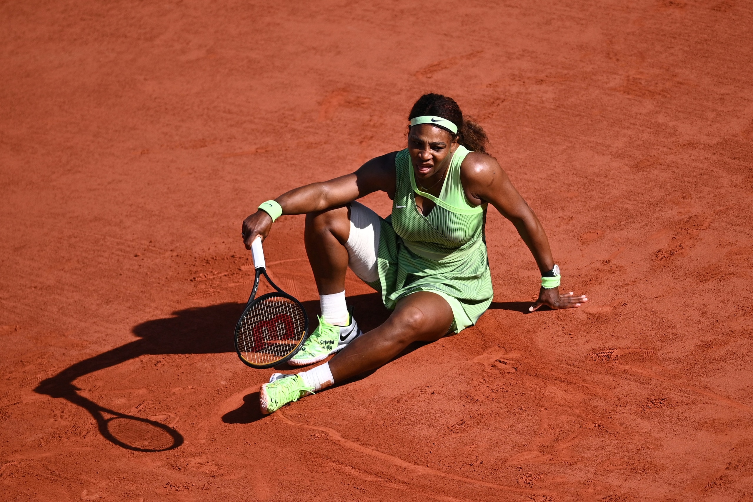 Serena Williams of the US reacts as she plays against Kazakhstan's Elena Rybakina during their women's singles fourth round tennis match on Day 8 of The Roland Garros 2021 French Open tennis tournament in Paris on June 6, 2021. (Photo by Anne-Christine POUJOULAT / AFP) (Photo by ANNE-CHRISTINE POUJOULAT/AFP via Getty Images)