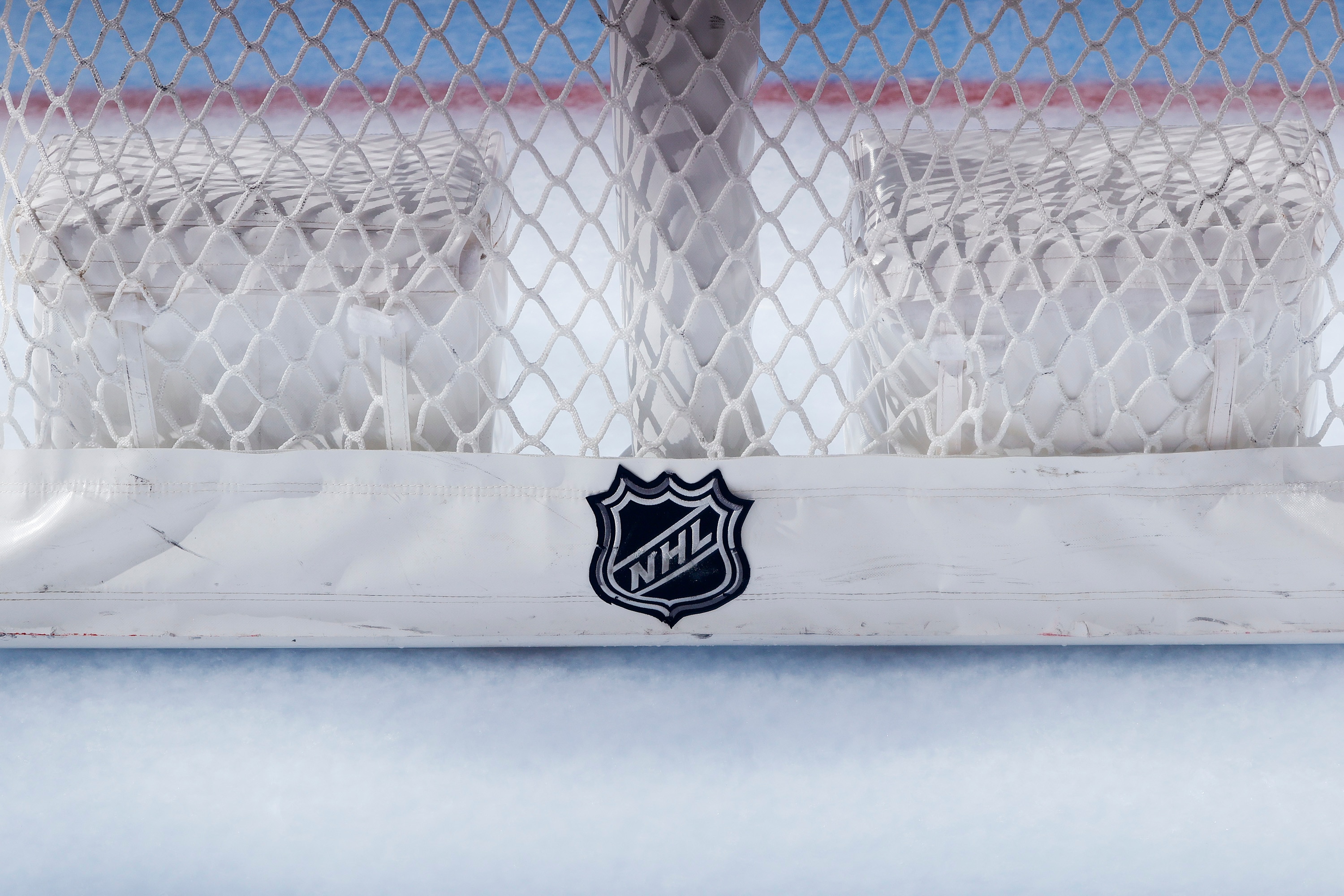 PHILADELPHIA, PENNSYLVANIA - FEBRUARY 24: The NHL logo is seen on a goal in a game between the Philadelphia Flyers and the New York Rangers at Wells Fargo Center on February 24, 2021 in Philadelphia, Pennsylvania. (Photo by Tim Nwachukwu/Getty Images)