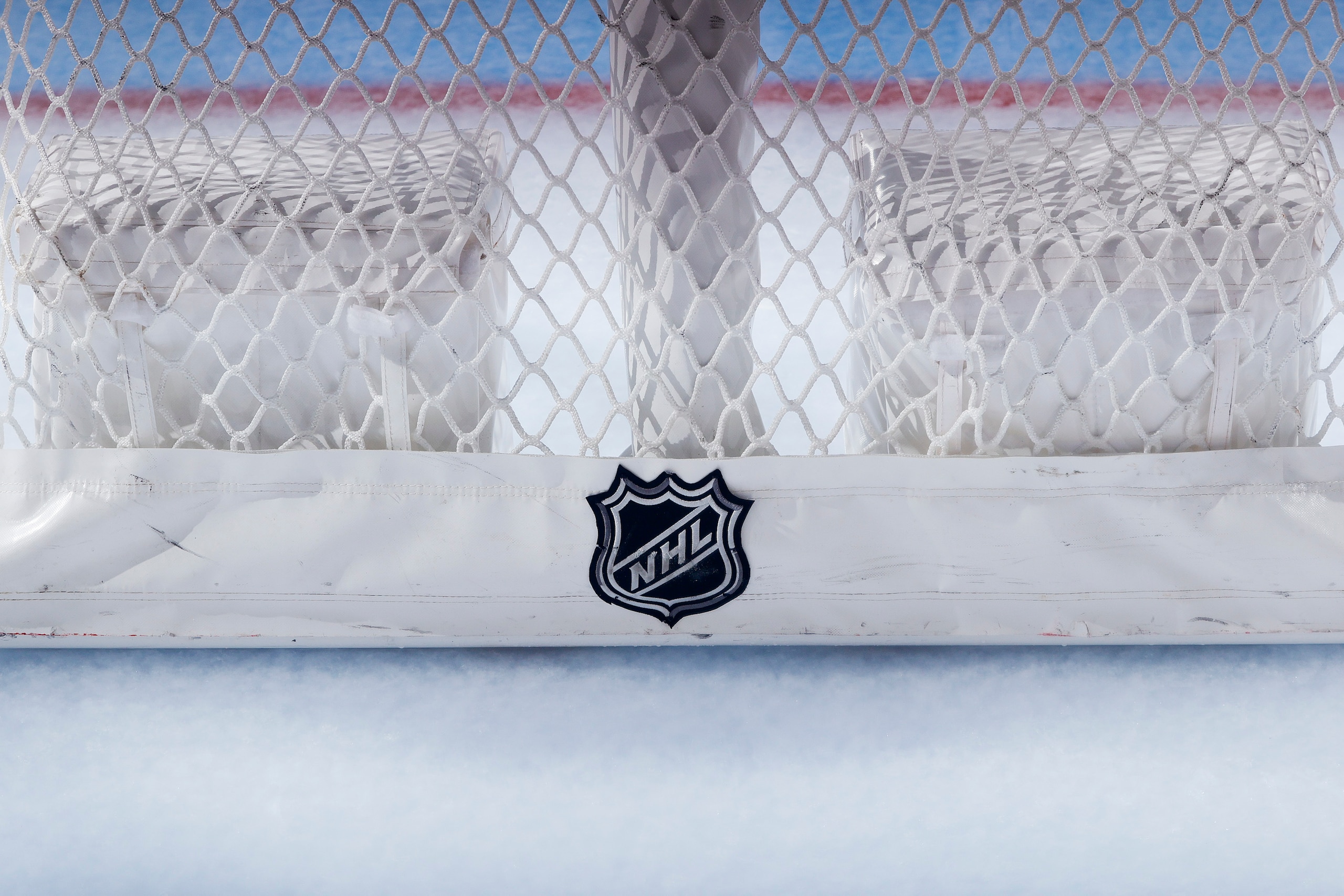PHILADELPHIA, PENNSYLVANIA - FEBRUARY 24: The NHL logo is seen on a goal in a game between the Philadelphia Flyers and the New York Rangers at Wells Fargo Center on February 24, 2021 in Philadelphia, Pennsylvania. (Photo by Tim Nwachukwu/Getty Images) PHILADELPHIA, PENNSYLVANIA - FEBRUARY 24: The NHL logo is seen on a goal in a game between the Philadelphia Flyers and the New York Rangers at Wells Fargo Center on February 24, 2021 in Philadelphia, Pennsylvania. (Photo by Tim Nwachukwu/Getty Images)