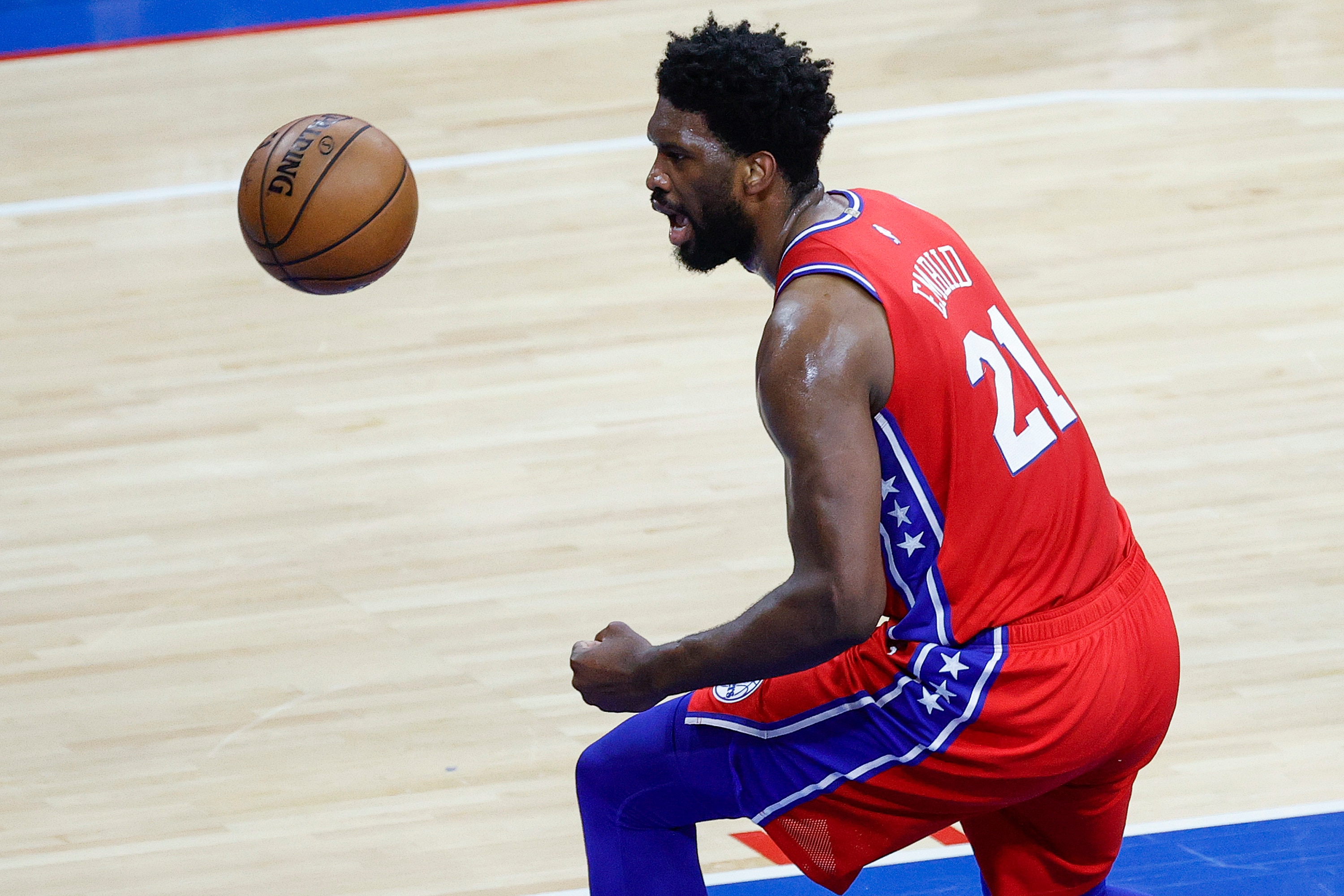 PHILADELPHIA, PENNSYLVANIA - JUNE 06: Joel Embiid #21 of the Philadelphia 76ers celebrates during the first quarter against the Atlanta Hawks during Game One of the Eastern Conference second round series at Wells Fargo Center on June 06, 2021 in Philadelphia, Pennsylvania. NOTE TO USER: User expressly acknowledges and agrees that, by downloading and or using this photograph, User is consenting to the terms and conditions of the Getty Images License Agreement. (Photo by Tim Nwachukwu/Getty Images)
