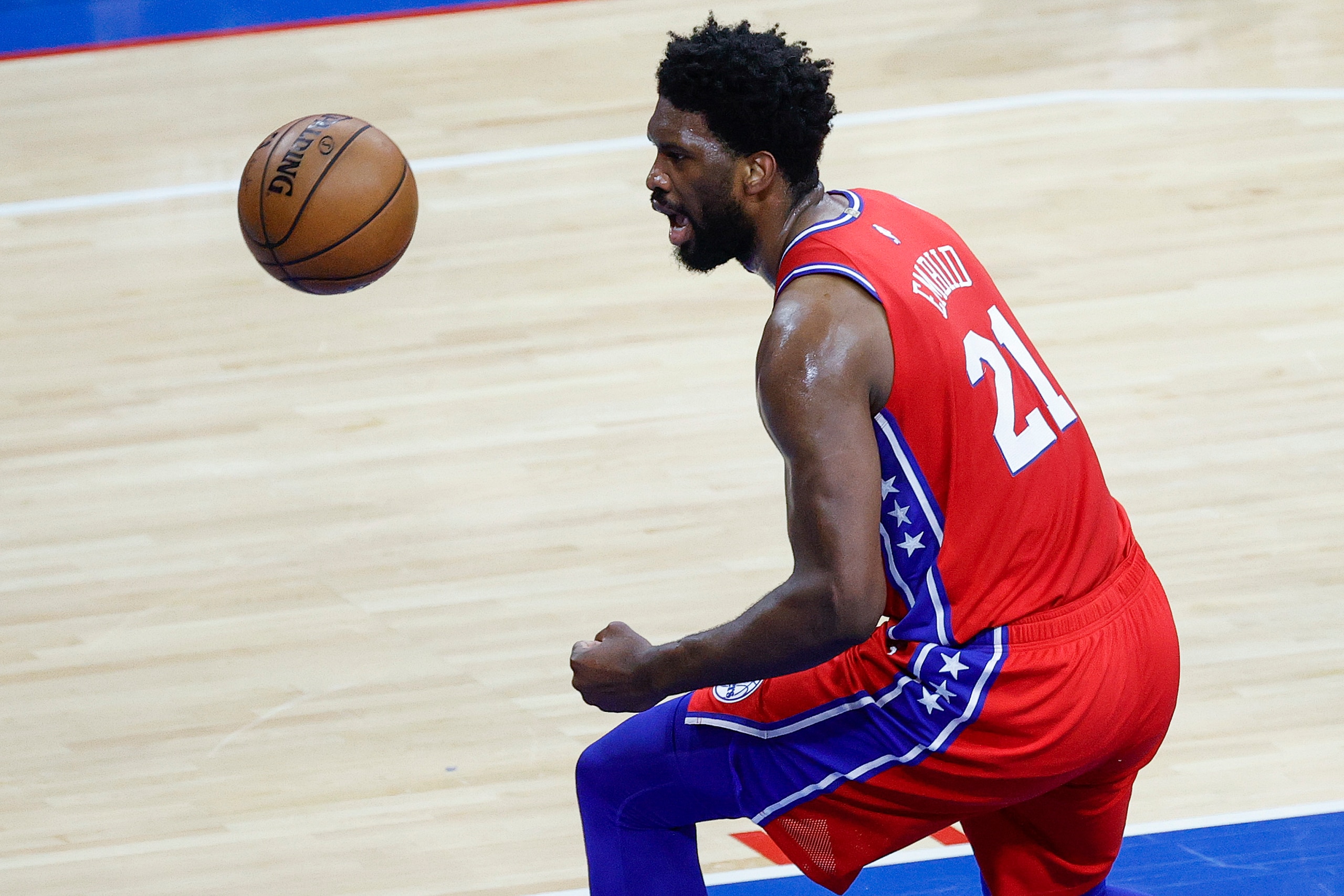 PHILADELPHIA, PENNSYLVANIA - JUNE 06: Joel Embiid #21 of the Philadelphia 76ers celebrates during the first quarter against the Atlanta Hawks during Game One of the Eastern Conference second round series at Wells Fargo Center on June 06, 2021 in Philadelphia, Pennsylvania. NOTE TO USER: User expressly acknowledges and agrees that, by downloading and or using this photograph, User is consenting to the terms and conditions of the Getty Images License Agreement. (Photo by Tim Nwachukwu/Getty Images)