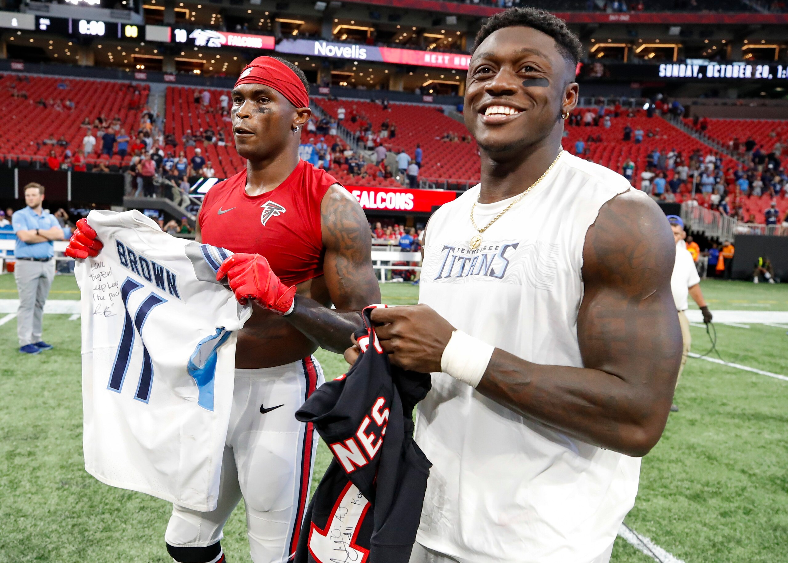 ATLANTA, GA - SEPTEMBER 29: Julio Jones #11 of the Atlanta Falcons swaps jerseys with A.J. Brown #11 of the Tennessee Titans at the conclusion of an NFL game at Mercedes-Benz Stadium on September 29, 2019 in Atlanta, Georgia. (Photo by Todd Kirkland/Getty Images)