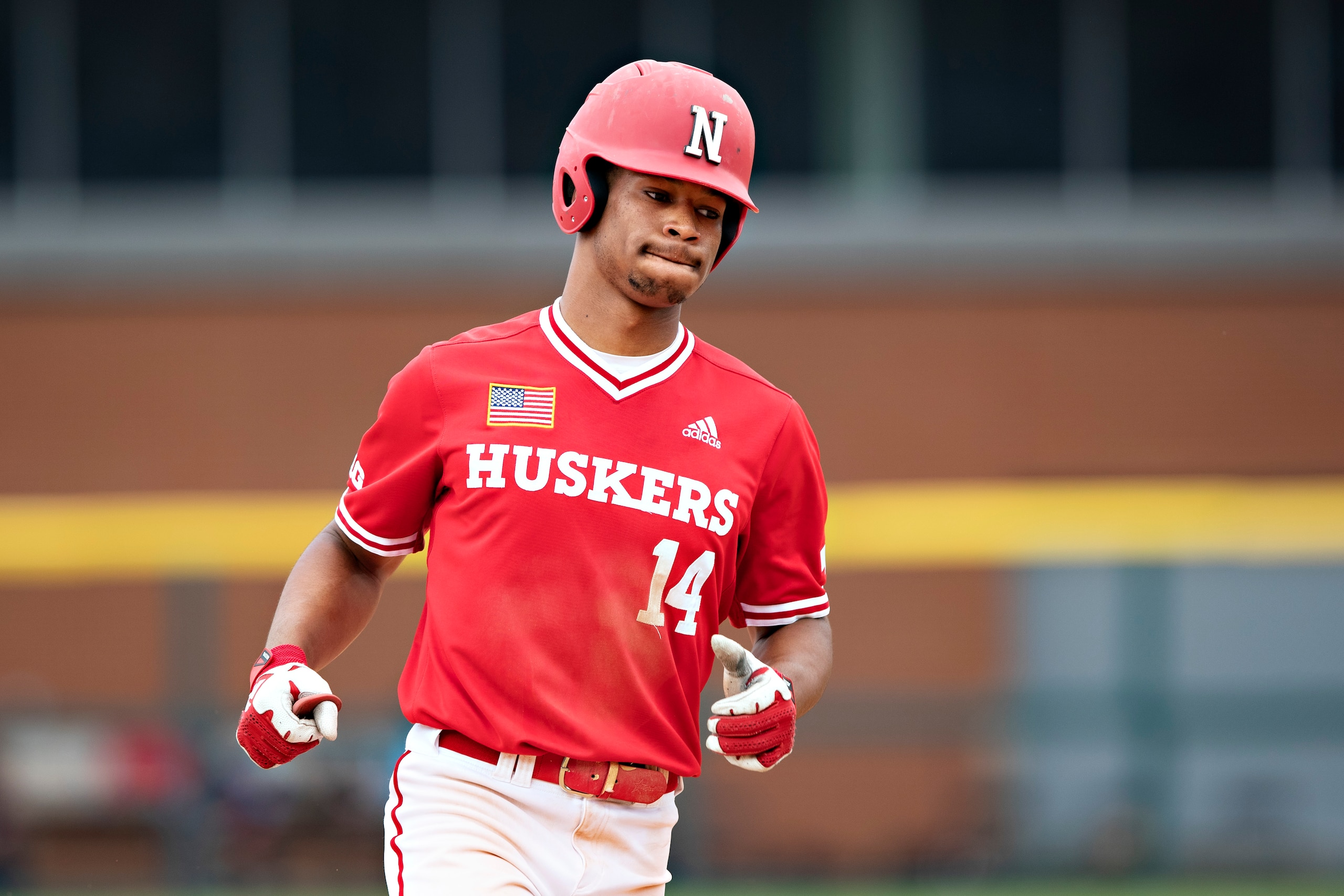 FAYETTEVILLE, ARKANSAS - JUNE 6: Brice Matthews of the Nebraska Cornhuskers rounds third base on his home run against the NJIT Highlanders during the NCAA Fayetteville Regional at Baum-Walker Stadium at George Cole Field on June 6, 2021 in Fayetteville, Arkansas. The Cornhuskers defeated the Highlanders 18-4.  (Photo by Wesley Hitt/Getty Images)