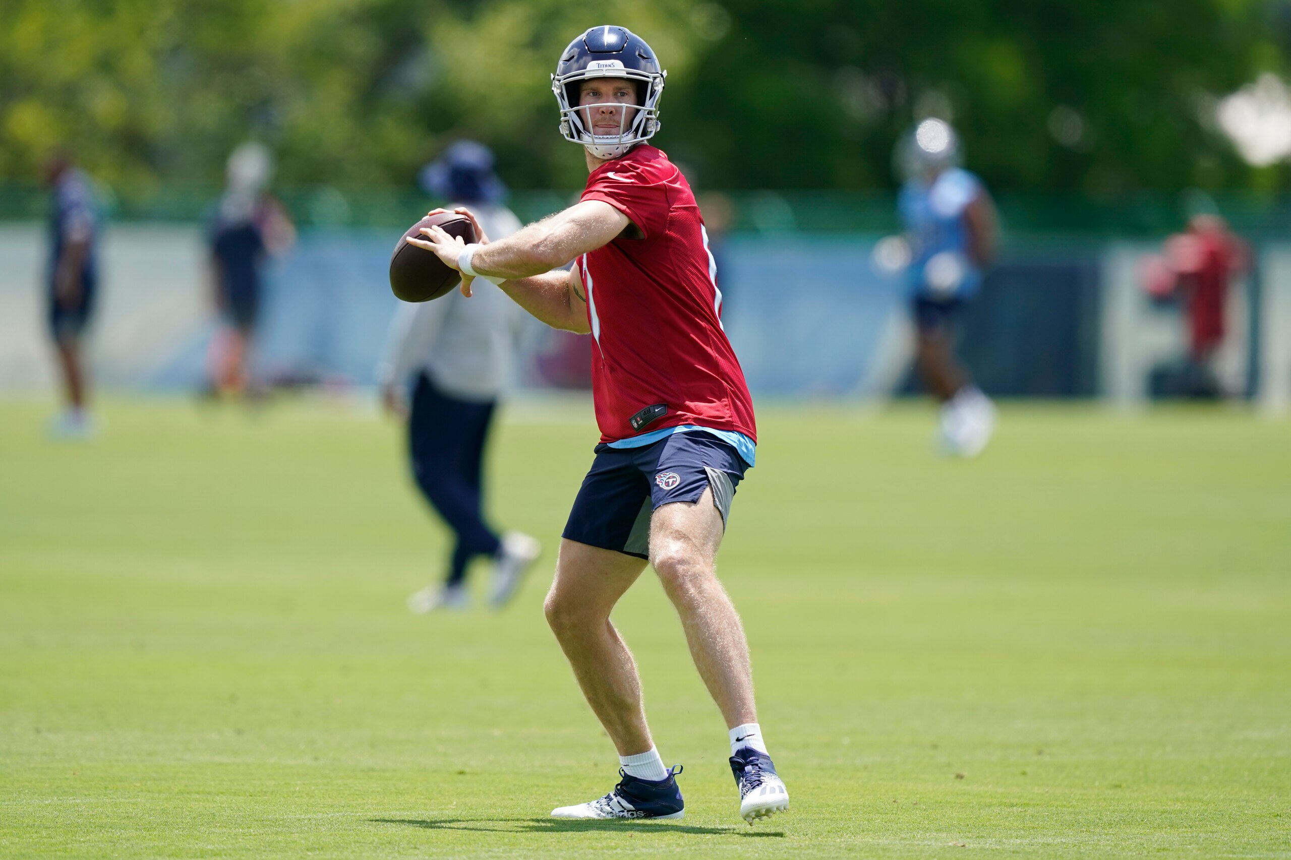 Tennessee Titans quarterback Ryan Tannehill throws during an NFL football practice Thursday, June 3, 2021, in Nashville, Tenn. (AP Photo/Mark Humphrey, Pool)