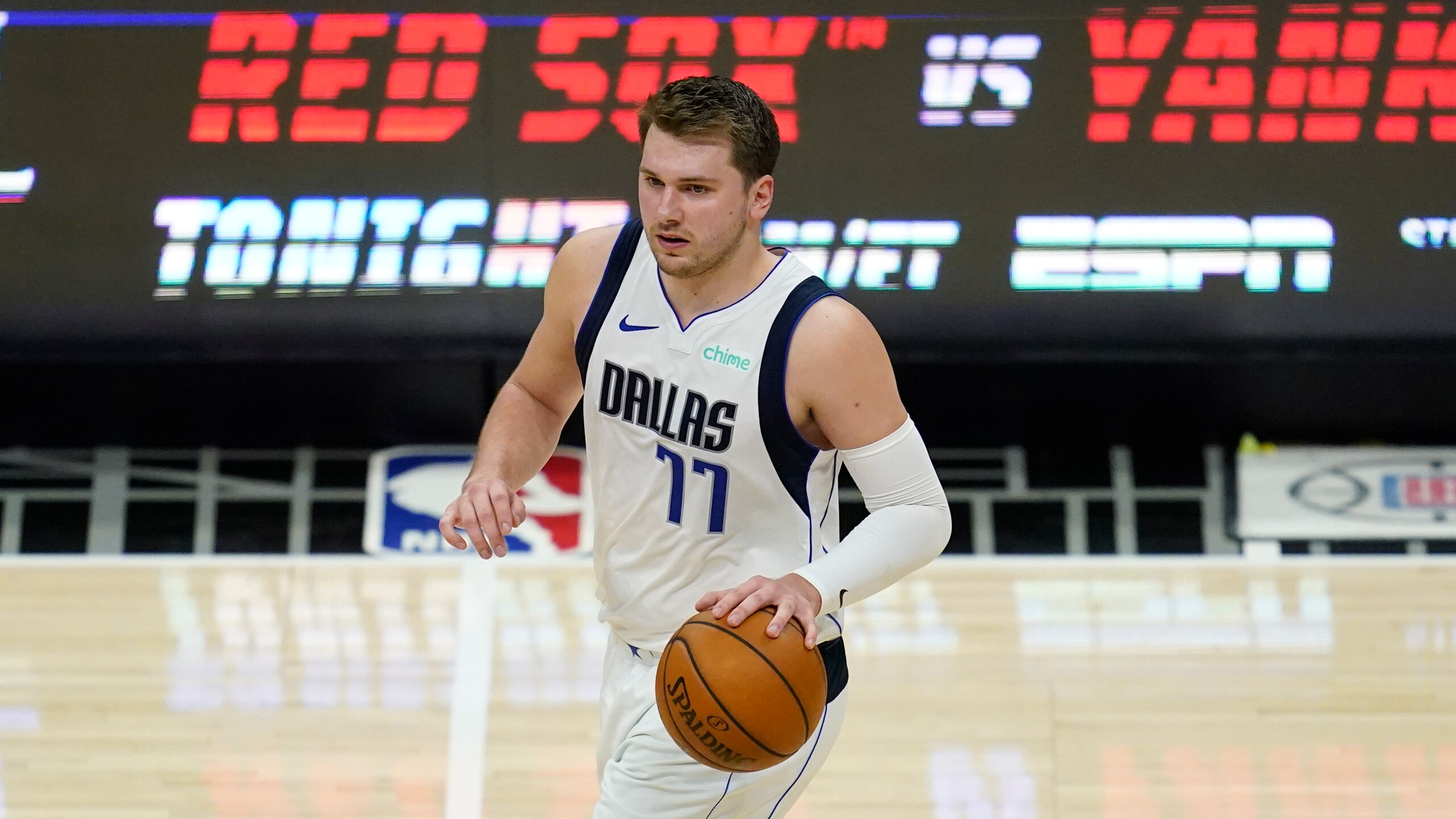 Dallas Mavericks guard Luka Doncic (77) controls the ball during Game 7 of an NBA basketball first-round playoff series against the Los Angeles Clippers Sunday, June 6, 2021, in Los Angeles, Calif. (AP Photo/Ashley Landis) Dallas Mavericks guard Luka Doncic (77) controls the ball during Game 7 of an NBA basketball first-round playoff series against the Los Angeles Clippers Sunday, June 6, 2021, in Los Angeles, Calif. (AP Photo/Ashley Landis)