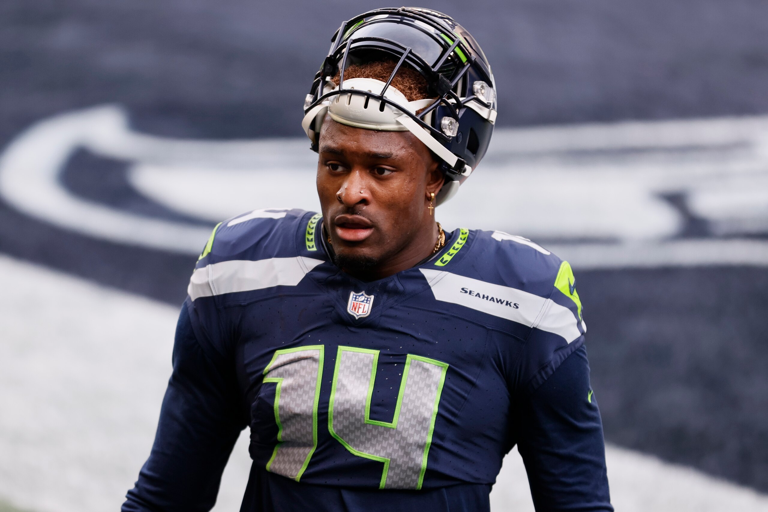 SEATTLE, WASHINGTON - JANUARY 09: Wide receiver DK Metcalf #14 of the Seattle Seahawks walks onto the field prior to the NFC Wild Card Playoff game against the Los Angeles Rams at Lumen Field on January 09, 2021 in Seattle, Washington. (Photo by Steph Chambers/Getty Images)