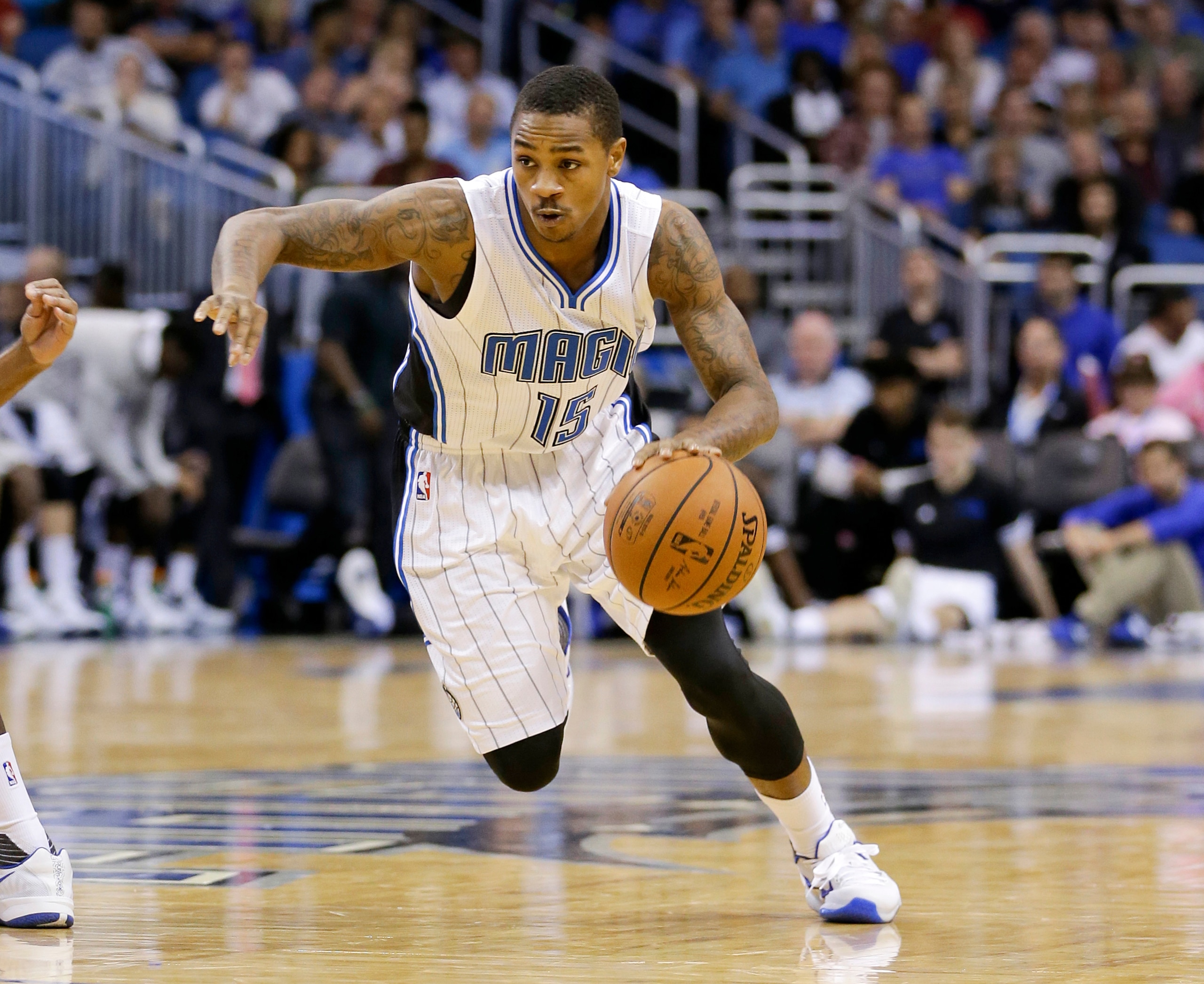 Orlando Magic guard Keith Appling (15) moves the ball against the Miami Heat during the second half of an NBA preseason basketball game, Tuesday, Oct. 13, 2015, in Orlando, Fla. Orlando won in overtime 95-92. (AP Photo/John Raoux)