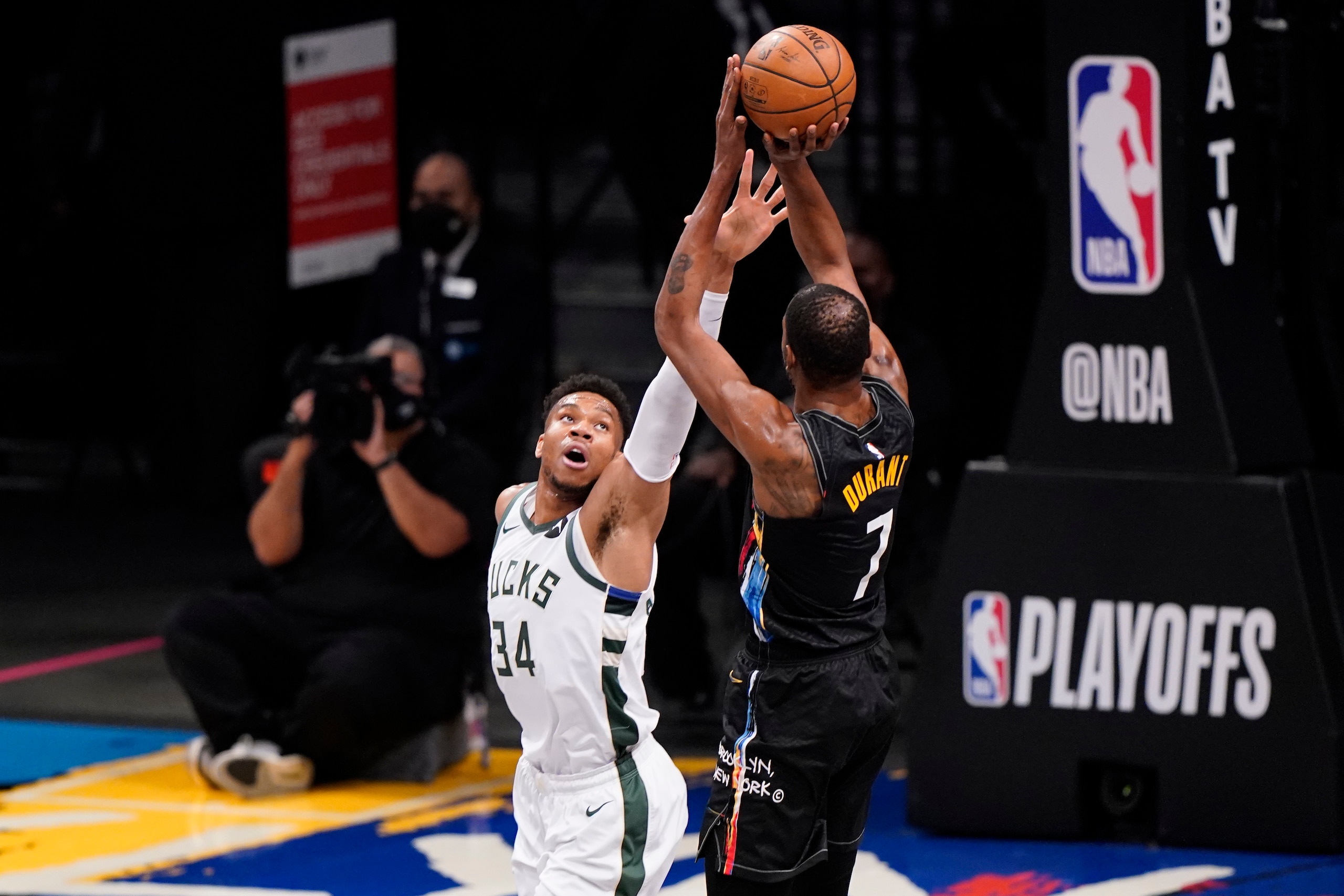Milwaukee Bucks forward Giannis Antetokounmpo (34) defends against Brooklyn Nets forward Kevin Durant (7) during the first half of Game 2 of an NBA basketball second-round playoff series, Monday, June 7, 2021, in New York. (AP Photo/Kathy Willens) Milwaukee Bucks forward Giannis Antetokounmpo (34) defends against Brooklyn Nets forward Kevin Durant (7) during the first half of Game 2 of an NBA basketball second-round playoff series, Monday, June 7, 2021, in New York. (AP Photo/Kathy Willens)