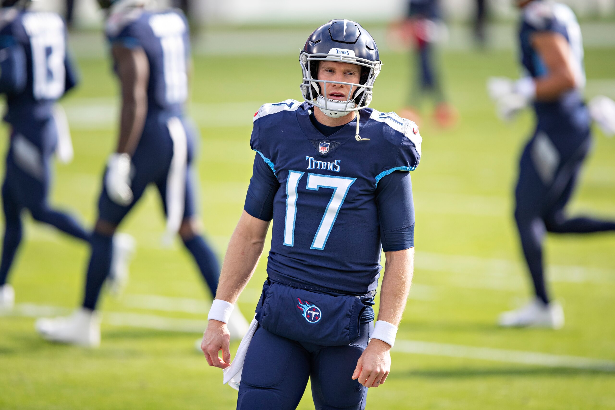 NASHVILLE, TENNESSEE - JANUARY 10: Quarterback Ryan Tannehill #17 of the Tennessee Titans warms up before their AFC Wild Card Playoff game against the Baltimore Ravens at Nissan Stadium on January 10, 2021 in Nashville, Tennessee. The Ravens defeated the Titans 20-13. (Photo by Wesley Hitt/Getty Images) NASHVILLE, TENNESSEE - JANUARY 10: Quarterback Ryan Tannehill #17 of the Tennessee Titans warms up before their AFC Wild Card Playoff game against the Baltimore Ravens at Nissan Stadium on January 10, 2021 in Nashville, Tennessee. The Ravens defeated the Titans 20-13. (Photo by Wesley Hitt/Getty Images)