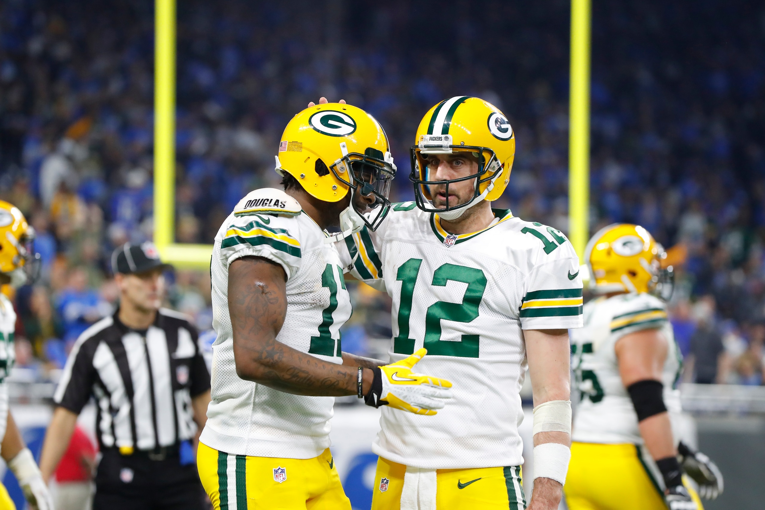 Green Bay Packers quarterback Aaron Rodgers (12) greets wide receiver Davante Adams after a touchdown during the second half of an NFL football game against the Detroit Lions, Sunday, Jan. 1, 2017, in Detroit. (AP Photo/Paul Sancya)