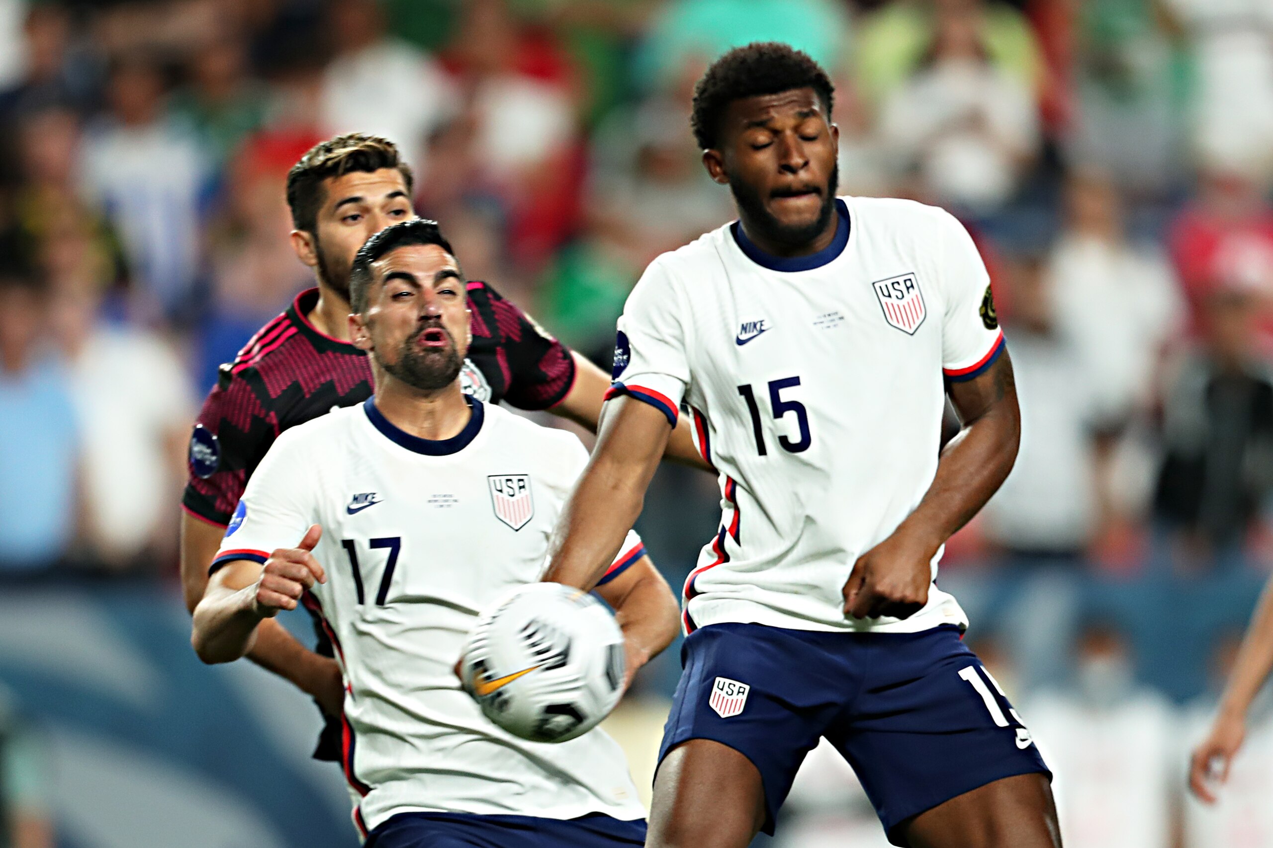 DENVER, CO - JUNE 06: Mark McKenzie #15 of United States use his hand to stop the ball during the CONCACAF Nations League Championship Final between United States and Mexico at Empower Field At Mile High on June 6, 2021 in Denver, Colorado. (Photo by Omar Vega/Getty Images)