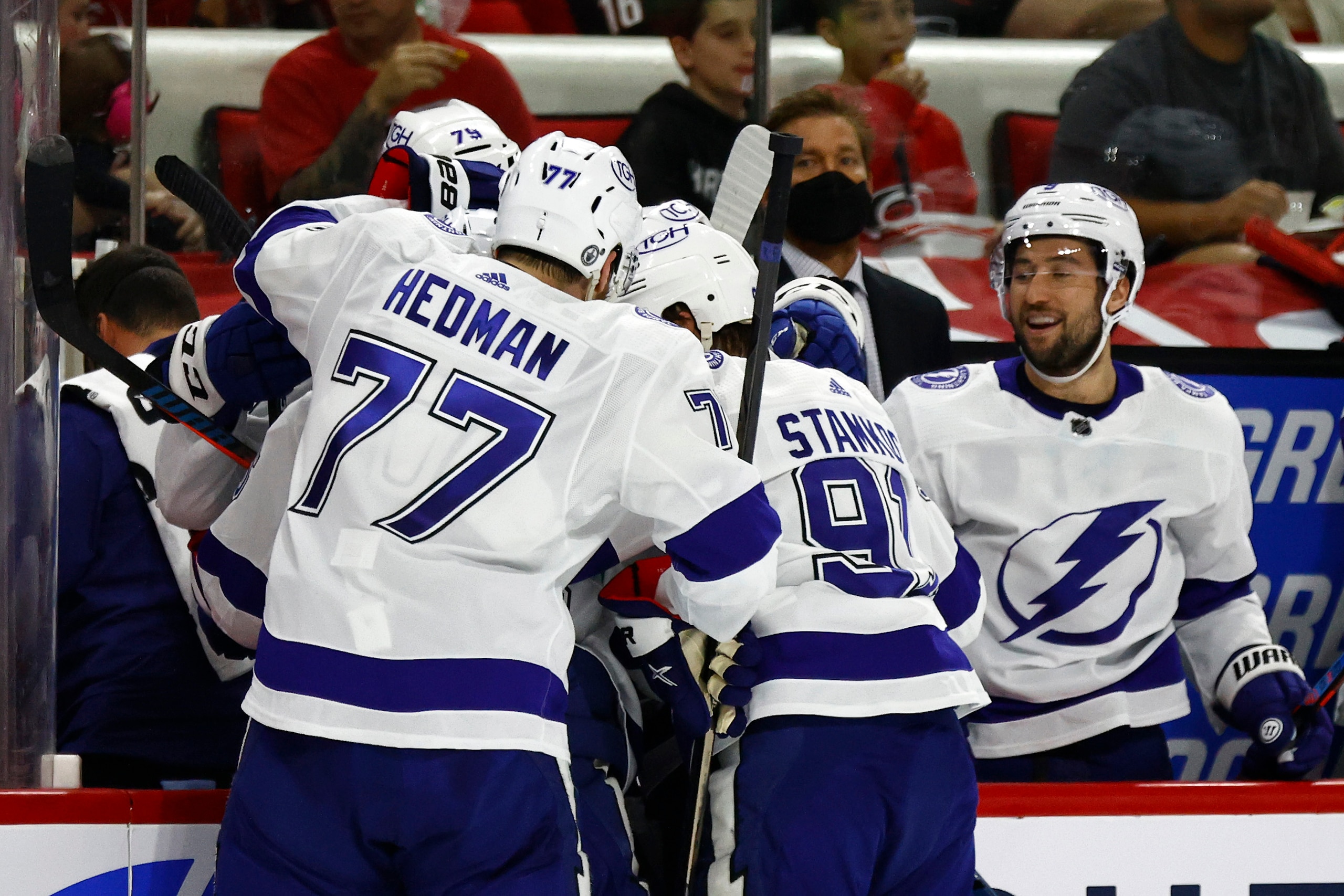 RALEIGH, NORTH CAROLINA - JUNE 08: The Tampa Bay Lightning celebrate a goal scored by Brayden Point #21 during the second period in Game Five of the Second Round of the 2021 Stanley Cup Playoffs against the Carolina Hurricanes at PNC Arena on June 08, 2021 in Raleigh, North Carolina. (Photo by Jared C. Tilton/Getty Images)