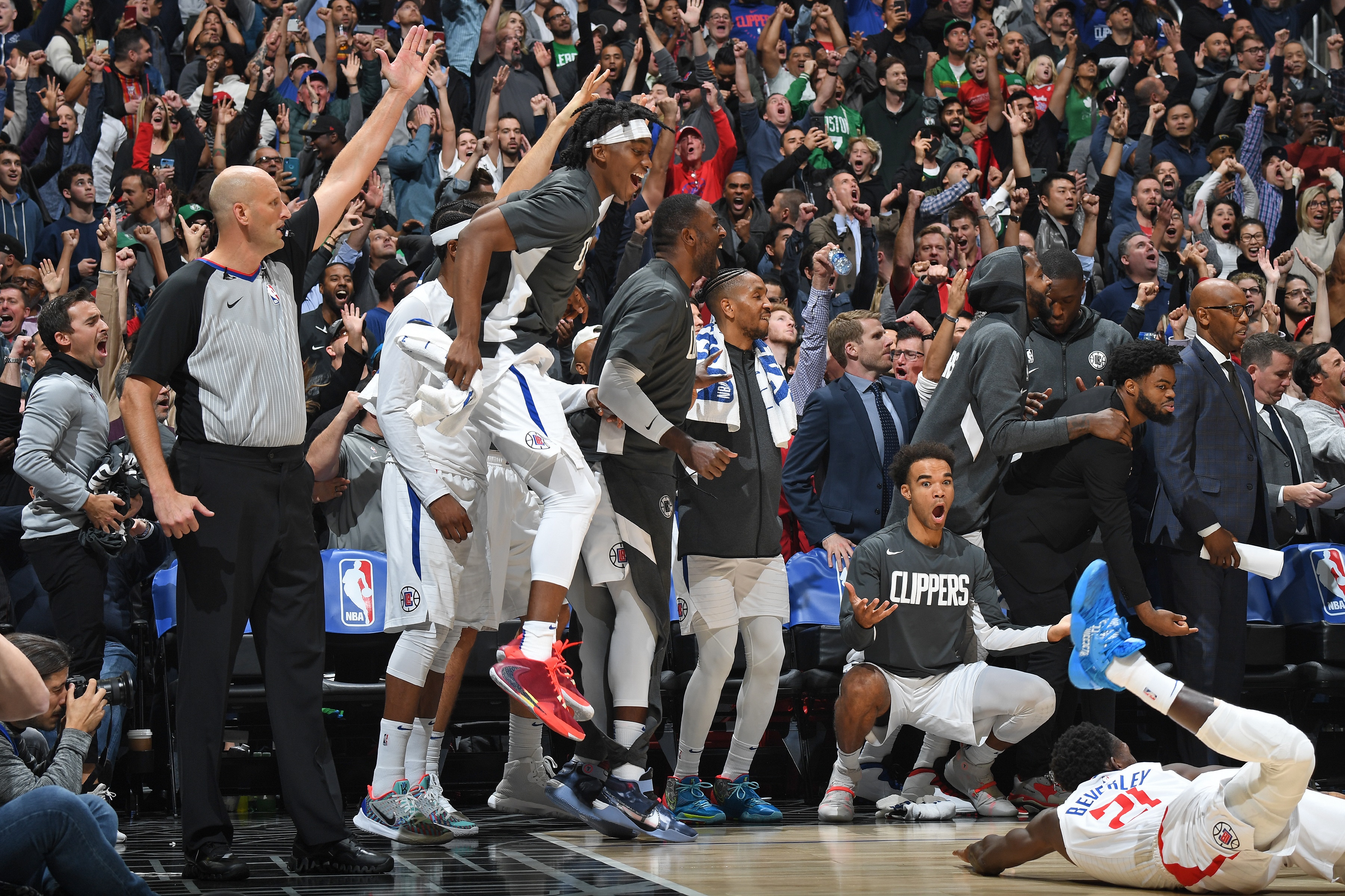 LOS ANGELES, CA - NOVEMBER 20:  The LA Clippers bench celebrates during the game against the Boston Celtics on November 20, 2019 at STAPLES Center in Los Angeles, California. NOTE TO USER: User expressly acknowledges and agrees that, by downloading and/or using this Photograph, user is consenting to the terms and conditions of the Getty Images License Agreement. Mandatory Copyright Notice: Copyright 2019 NBAE (Photo by Andrew D. Bernstein/NBAE via Getty Images)