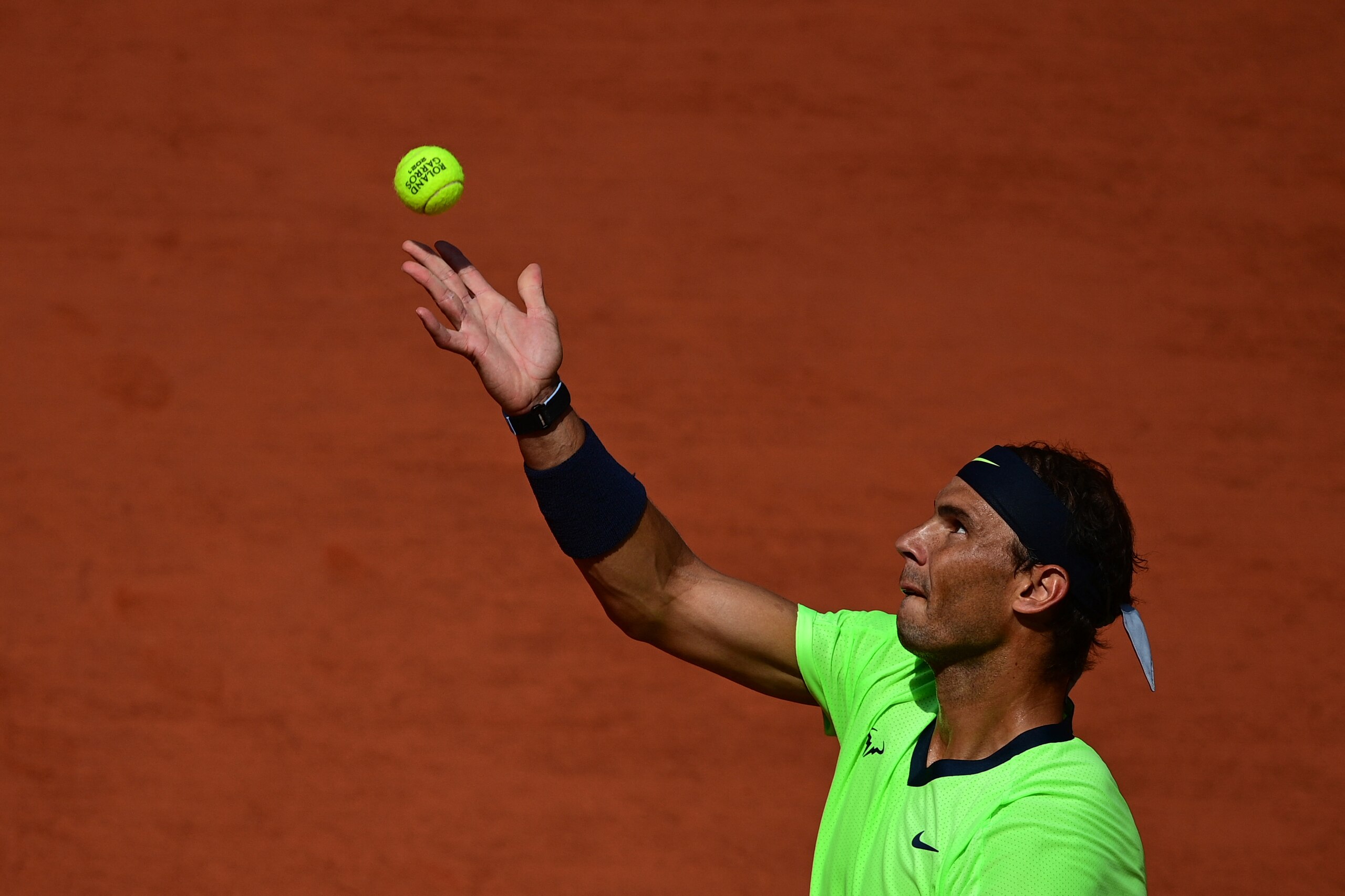Spain's Rafael Nadal serves the ball to Argentina's Diego Schwartzman during their men's singles quarter-final tennis match on Day 11 of The Roland Garros 2021 French Open tennis tournament in Paris on June 9, 2021. (Photo by MARTIN BUREAU / AFP) (Photo by MARTIN BUREAU/AFP via Getty Images)
