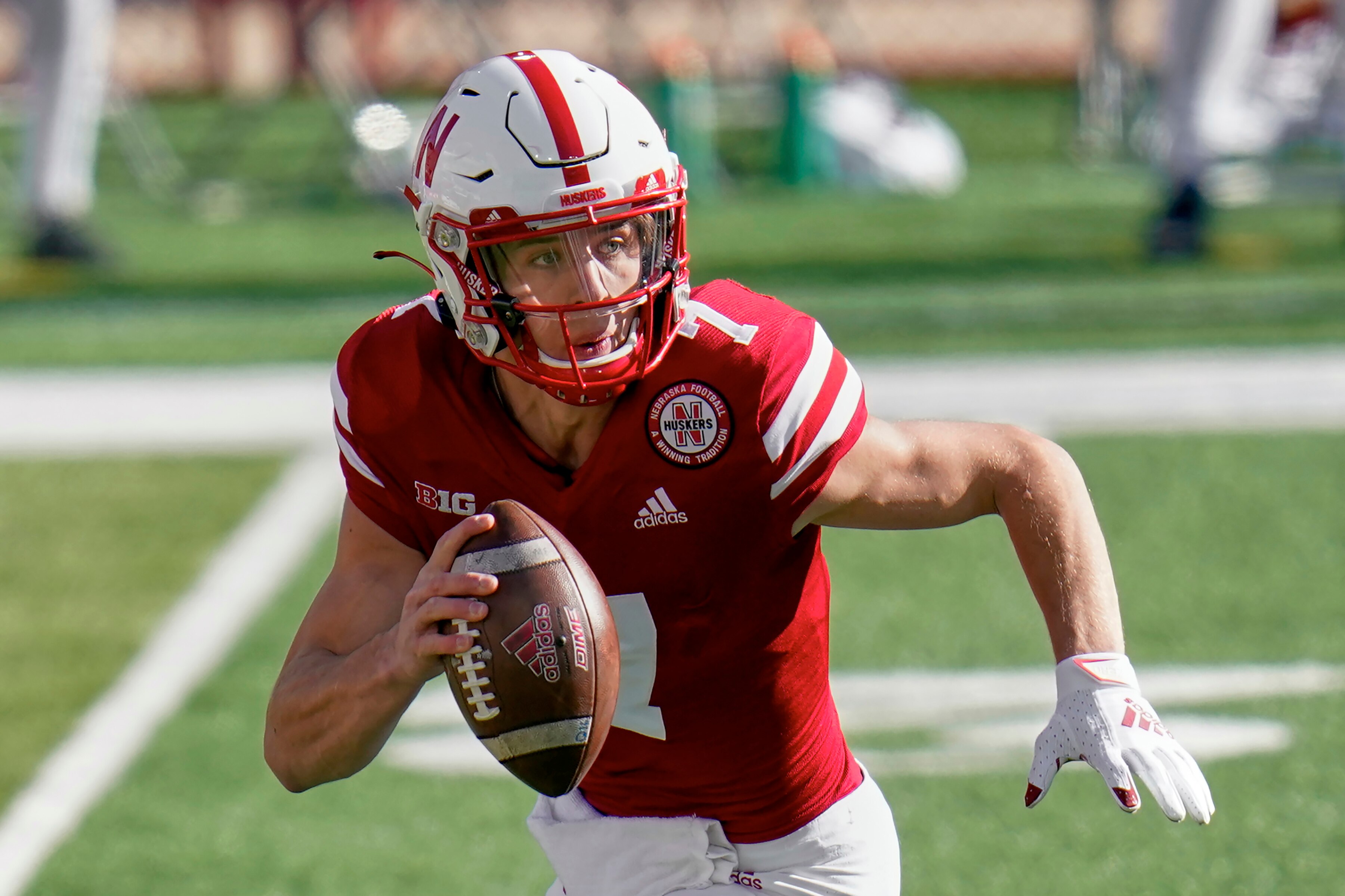 Nebraska quarterback Luke McCaffrey (7) plays during the first half of an NCAA college football game against Penn State in Lincoln, Neb., Saturday, Nov. 14, 2020. Nebraska backup quarterback Luke McCaffrey has entered the transfer portal after starting two games and appearing in five others last season, the school's athletic department confirmed Tuesday, Jan. 26, 2021. (AP Photo/Nati Harnik)