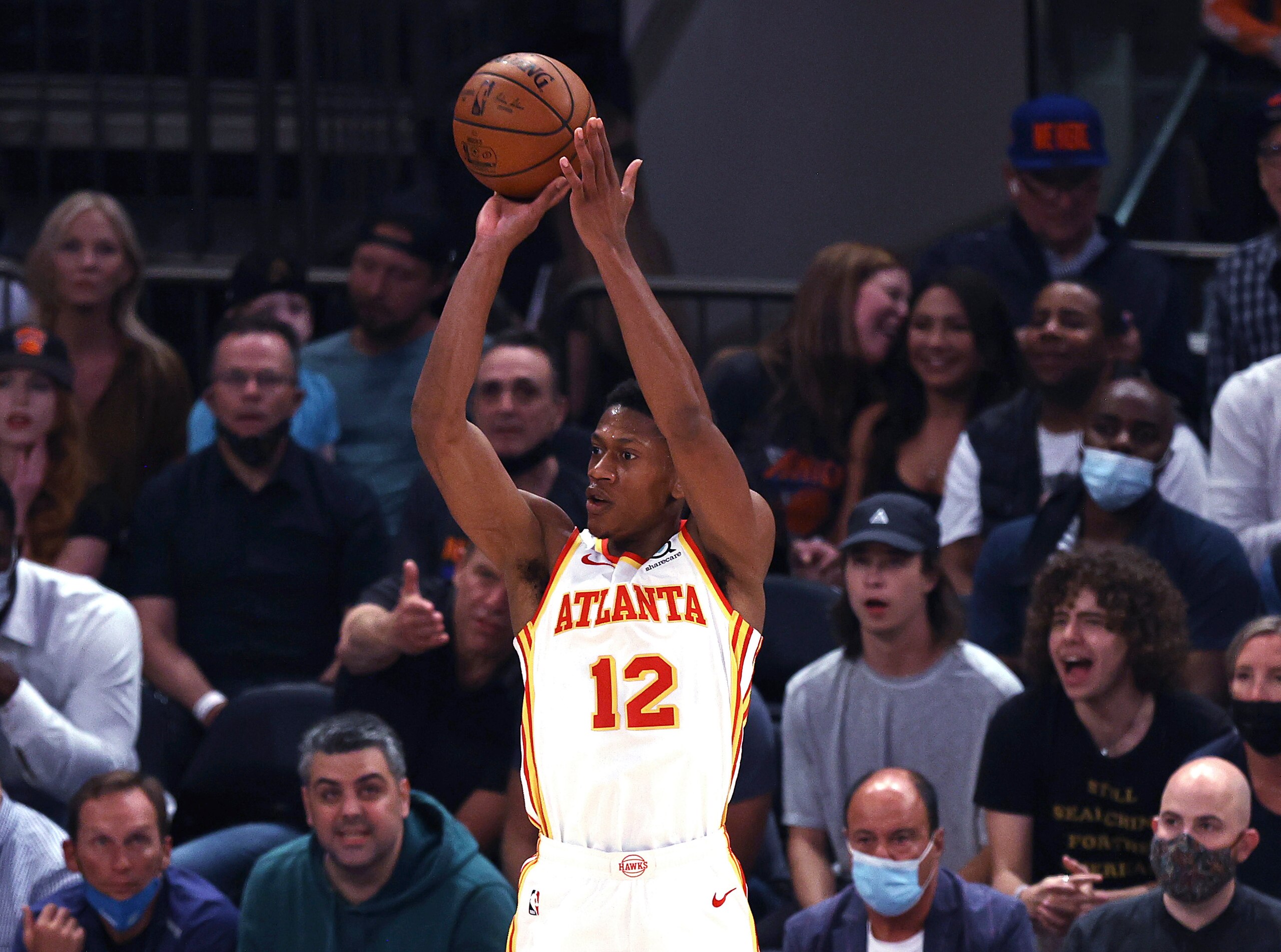Atlanta Hawks' De'Andre Hunter shoots a 3-pointer during the first quarter against the New York Knicks in Game 2 in an NBA basketball first-round playoff series Wednesday, May 26, 2021, in New York. (Elsa/Pool Photo via AP)