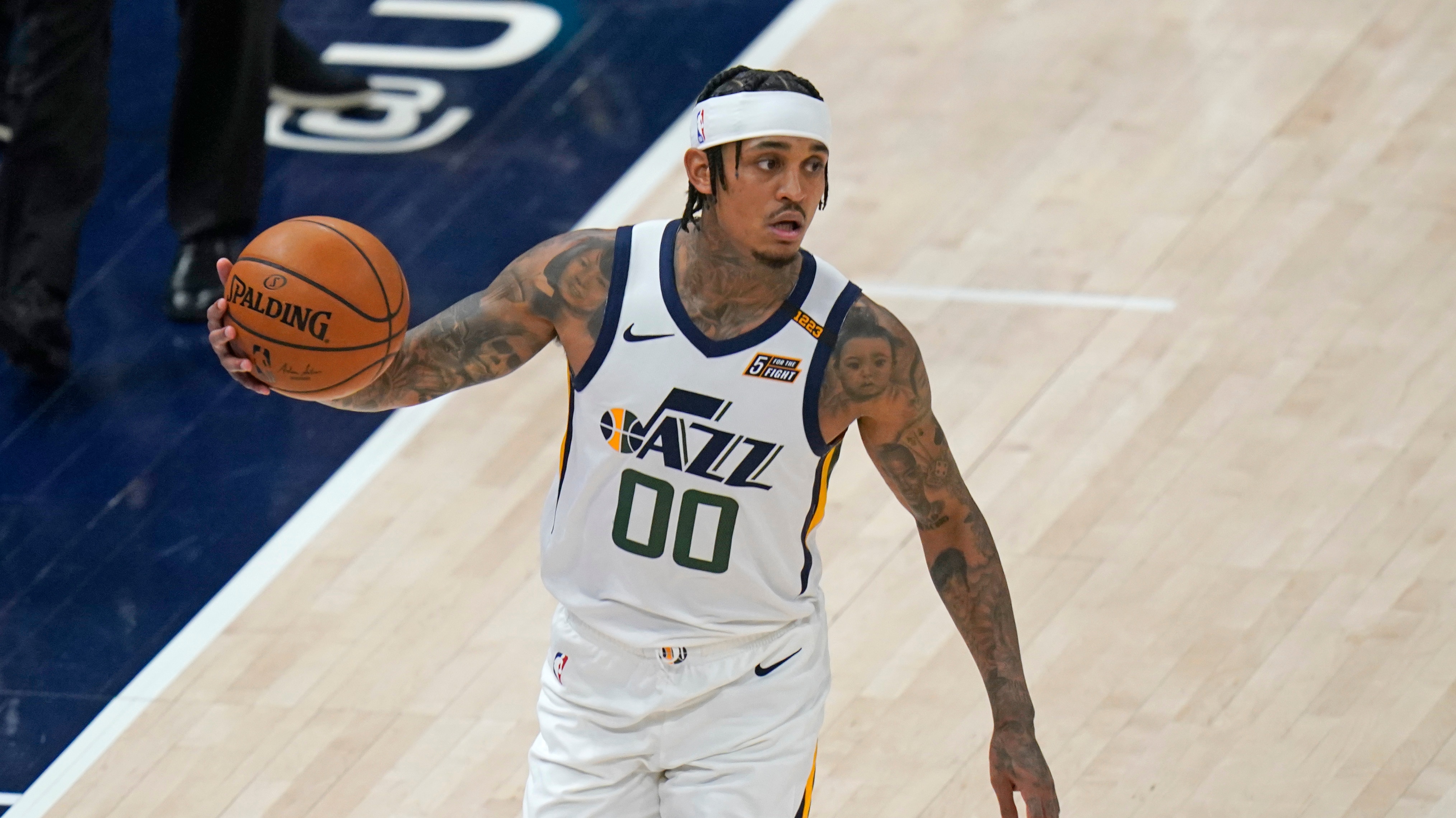 Utah Jazz guard Jordan Clarkson (00) brings the ball up court during the second half of Game 1 of their NBA basketball first-round playoff series against the Memphis Grizzlies Sunday, May 23, 2021, in Salt Lake City. (AP Photo/Rick Bowmer)