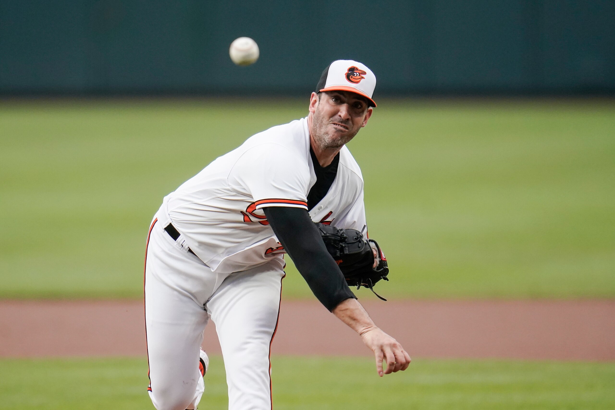 Baltimore Orioles starting pitcher Matt Harvey throws a pitch to the New York Mets during the first inning of a baseball game, Wednesday, June 9, 2021, in Baltimore. (AP Photo/Julio Cortez)