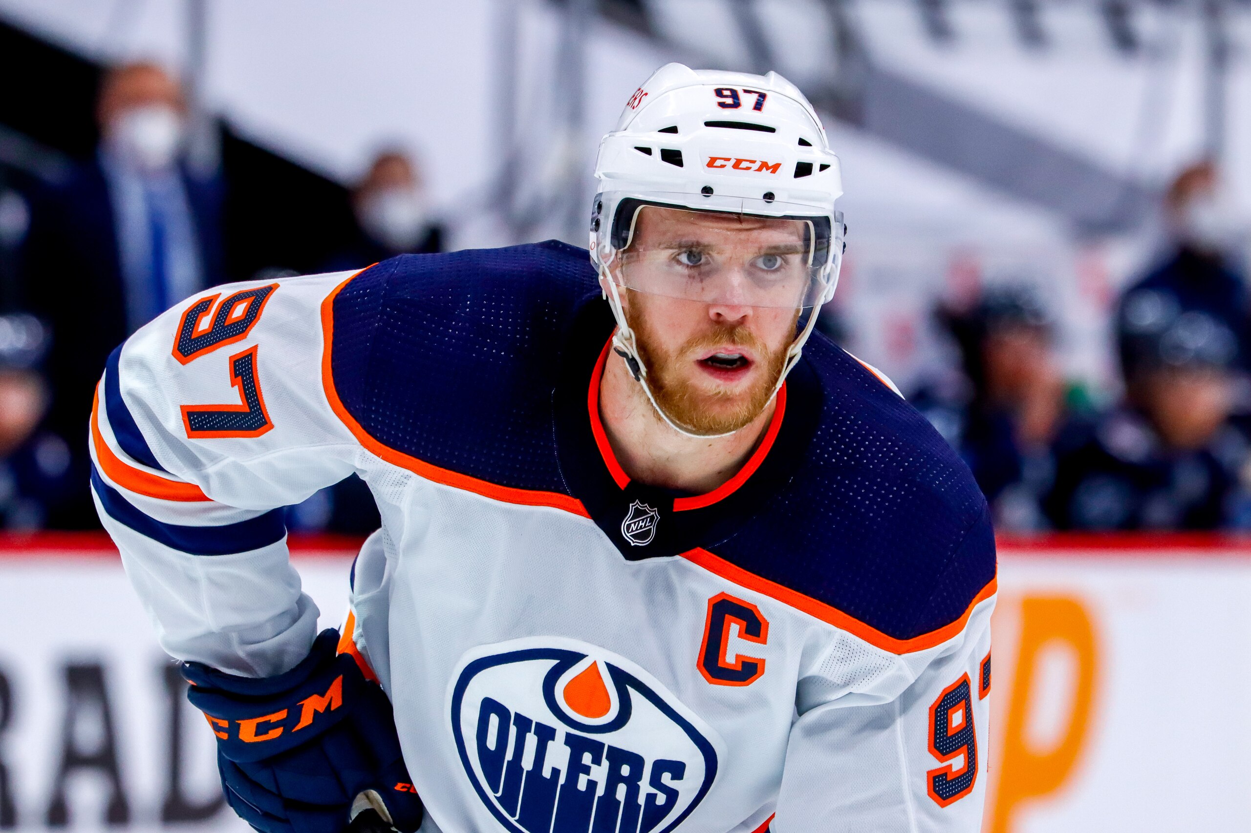 WINNIPEG, MB - MAY 24: Connor McDavid #97 of the Edmonton Oilers prepares for a second period face-off against the Winnipeg Jets in Game Four of the First Round of the 2021 Stanley Cup Playoffs at Bell MTS Place on May 24, 2021 in Winnipeg, Manitoba. (Photo by Darcy Finley/NHLI via Getty Images)
