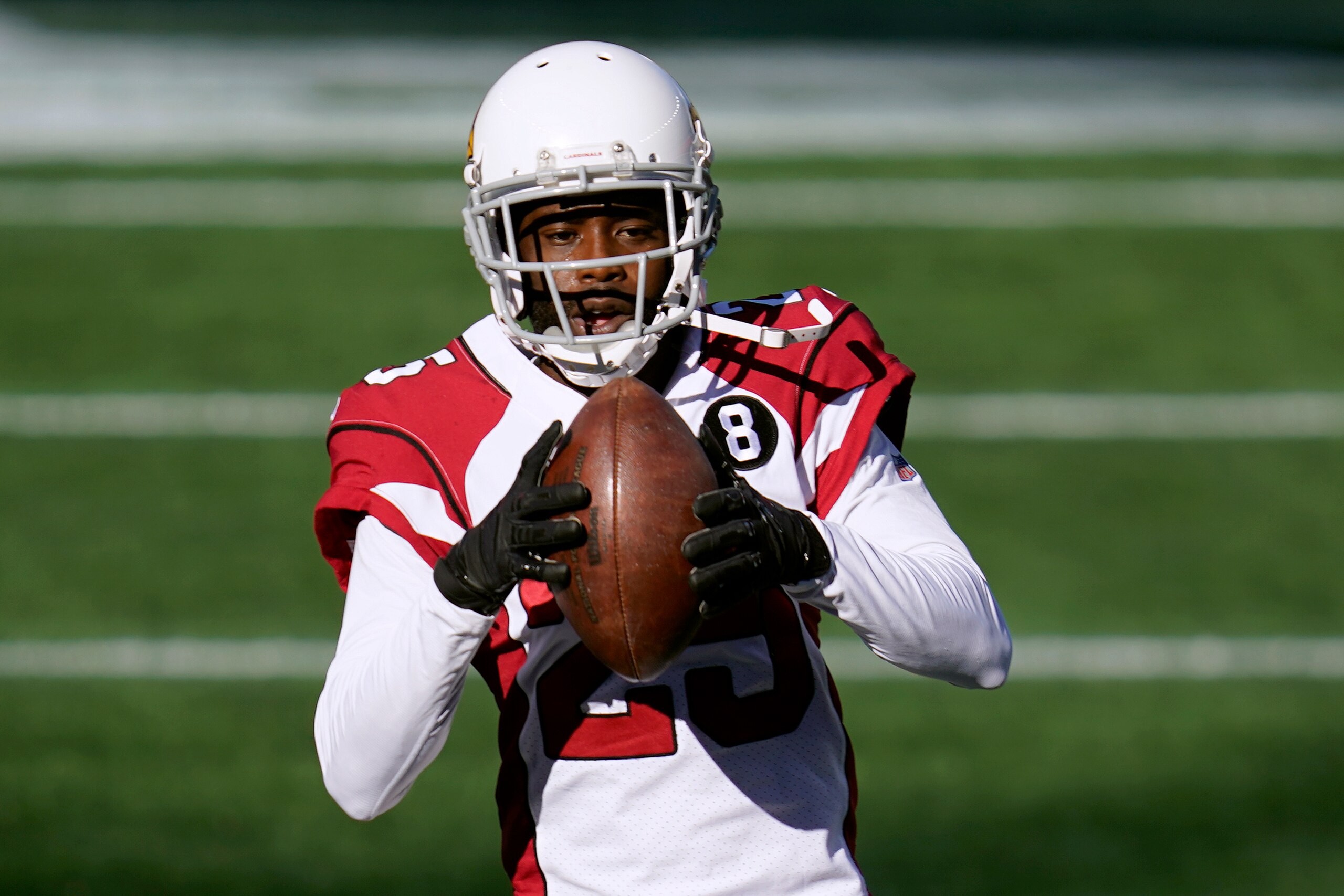 Arizona Cardinals cornerback Johnathan Joseph warms up before an NFL football game against the New England Patriots, Sunday, Nov. 29, 2020, in Foxborough, Mass. (AP Photo/Charles Krupa)