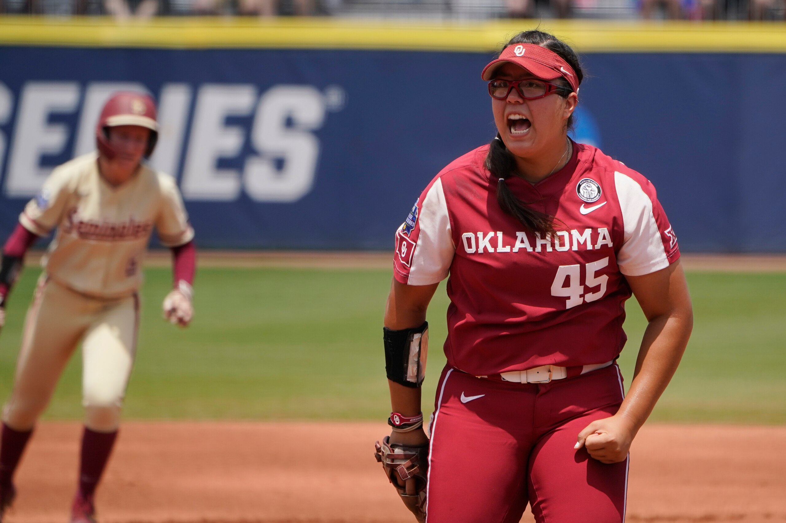 Oklahoma's Giselle Juarez (45) reacts after striking out Florida State's Cassidy Davis to end the first half of the first inning of the final game of the NCAA Women's College World Series softball championship series Thursday, June 10, 2021, in Oklahoma City. (AP Photo/Sue Ogrocki) Oklahoma's Giselle Juarez (45) reacts after striking out Florida State's Cassidy Davis to end the first half of the first inning of the final game of the NCAA Women's College World Series softball championship series Thursday, June 10, 2021, in Oklahoma City. (AP Photo/Sue Ogrocki)