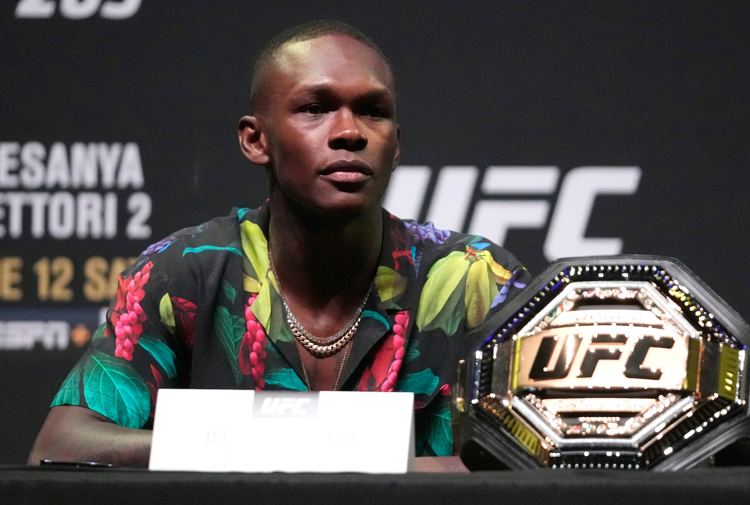 PHOENIX, ARIZONA - JUNE 10: Israel Adesanya of Nigeria interacts with media during the UFC 263 press conference at Arizona Federal Theater on June 10, 2021 in Phoenix, Arizona. (Photo by Jeff Bottari/Zuffa LLC) PHOENIX, ARIZONA - JUNE 10: Israel Adesanya of Nigeria interacts with media during the UFC 263 press conference at Arizona Federal Theater on June 10, 2021 in Phoenix, Arizona. (Photo by Jeff Bottari/Zuffa LLC)