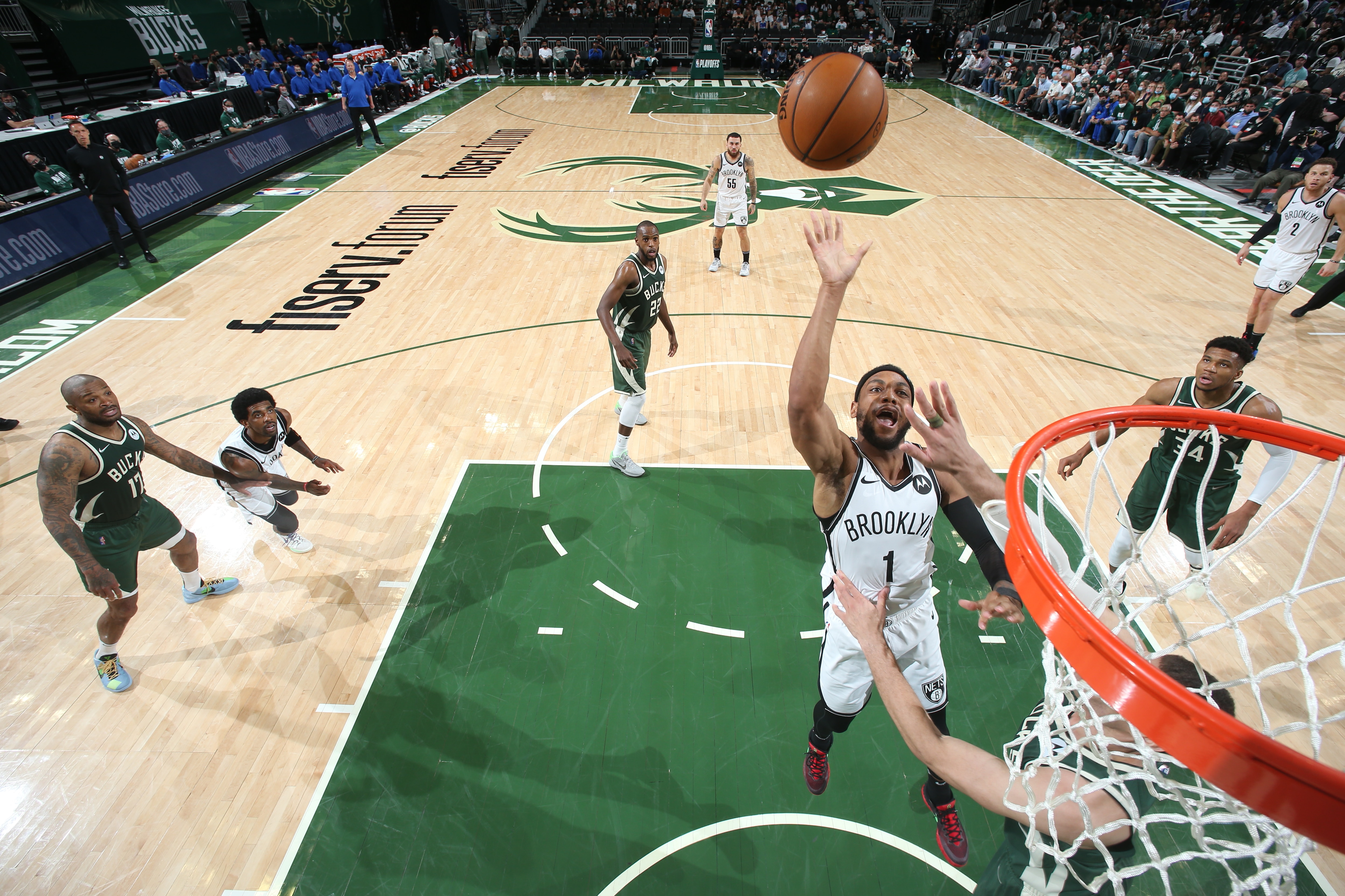 MILWAUKEE, WI - JUNE 10: Bruce Brown #1 of the Brooklyn Nets shoots the ball against the Milwaukee Bucks during Round 2, Game 3 of the 2021 NBA Playoffs on June 10, 2021 at the Fiserv Forum Center in Milwaukee, Wisconsin. NOTE TO USER: User expressly acknowledges and agrees that, by downloading and or using this Photograph, user is consenting to the terms and conditions of the Getty Images License Agreement. Mandatory Copyright Notice: Copyright 2021 NBAE (Photo by Nathaniel S. Butler/NBAE via Getty Images).