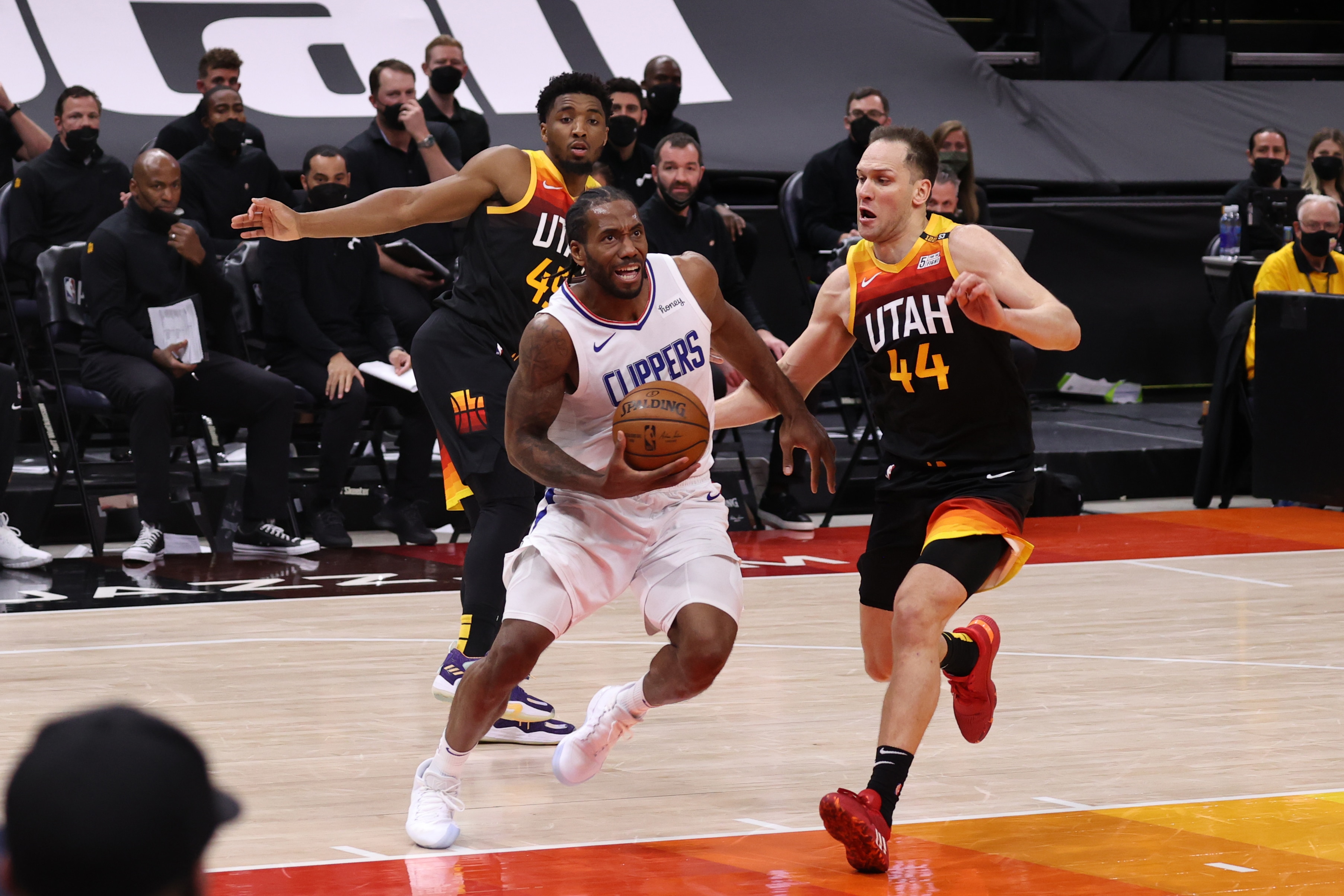 SALT LAKE CITY, UT - JUNE 10: Kawhi Leonard #2 of the LA Clippers drives to the basket during the game against the Utah Jazz during Round 2, Game 2 of the 2021 NBA Playoffs on June 10, 2021 at vivint.SmartHome Arena in Salt Lake City, Utah. NOTE TO USER: User expressly acknowledges and agrees that, by downloading and or using this Photograph, User is consenting to the terms and conditions of the Getty Images License Agreement. Mandatory Copyright Notice: Copyright 2021 NBAE (Photo by Melissa Majchrzak/NBAE via Getty Images)