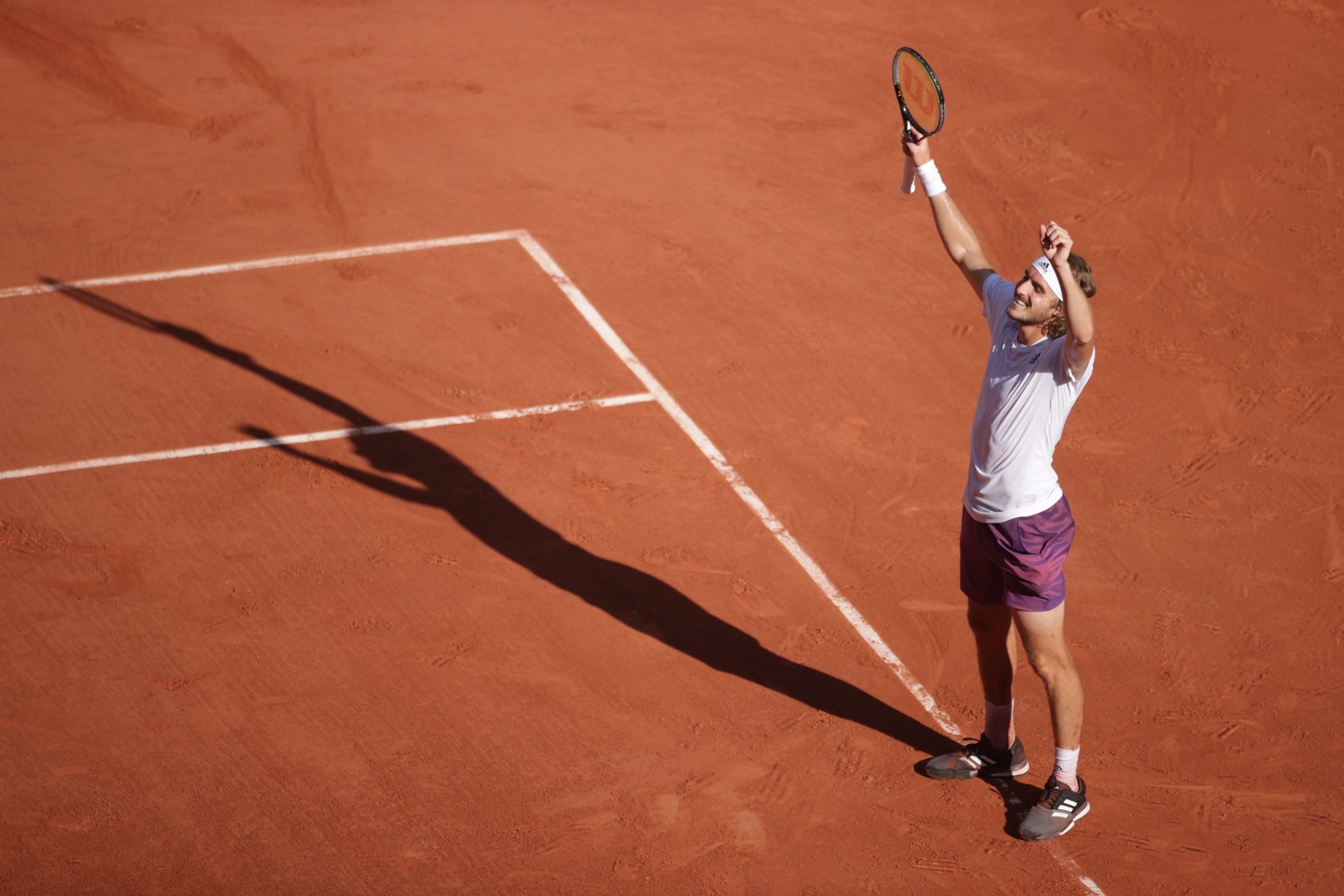 PARIS, FRANCE June 11.   Stefanos Tsitsipas of Greece celebrates his five set victory against Alexander Zverev of Germany on Court Philippe-Chatrier during the semi finals of the singles competition at the 2021 French Open Tennis Tournament at Roland Garros on June 11th 2021 in Paris, France. (Photo by Tim Clayton/Corbis via Getty Images)