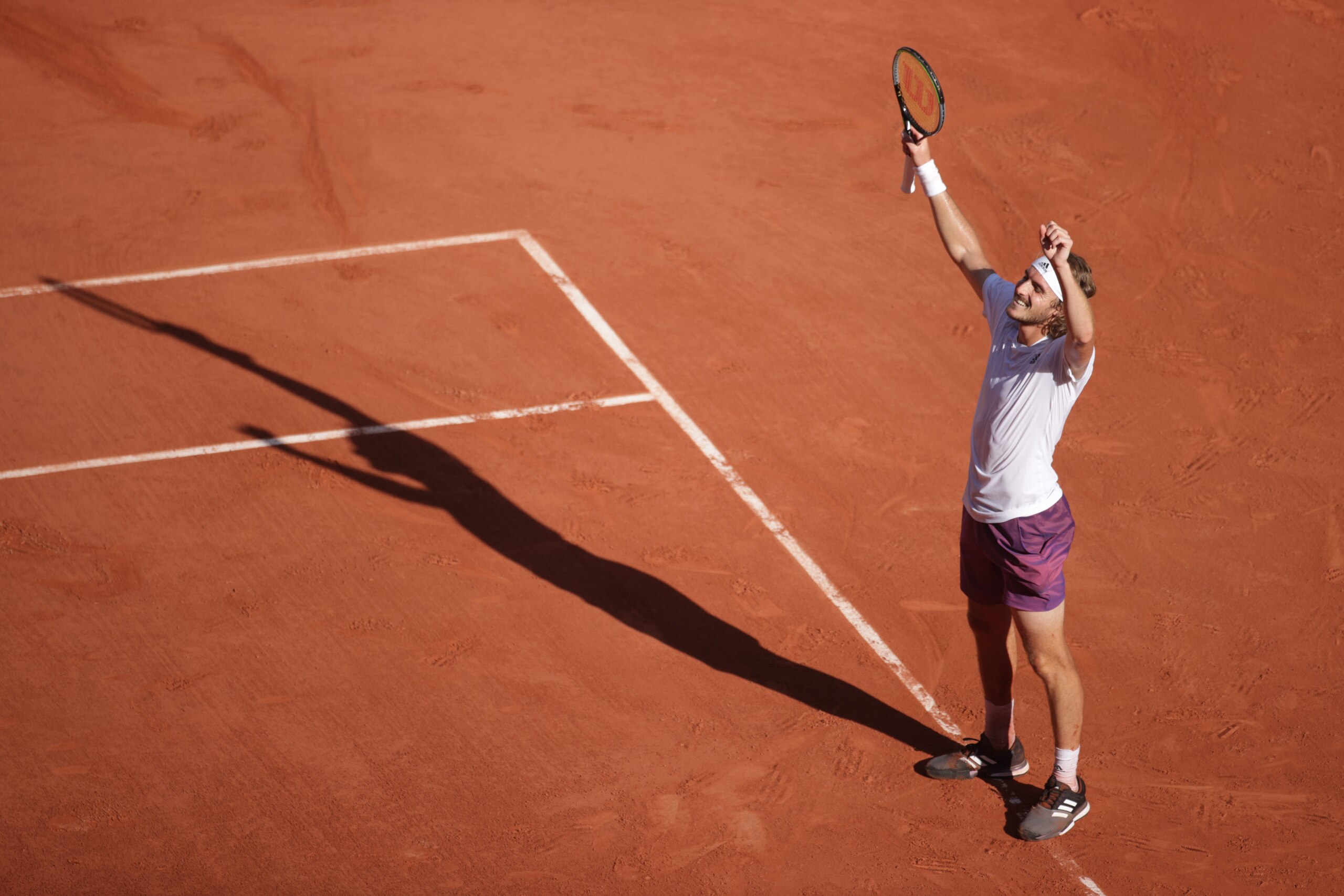 PARIS, FRANCE June 11.   Stefanos Tsitsipas of Greece celebrates his five set victory against Alexander Zverev of Germany on Court Philippe-Chatrier during the semi finals of the singles competition at the 2021 French Open Tennis Tournament at Roland Garros on June 11th 2021 in Paris, France. (Photo by Tim Clayton/Corbis via Getty Images)