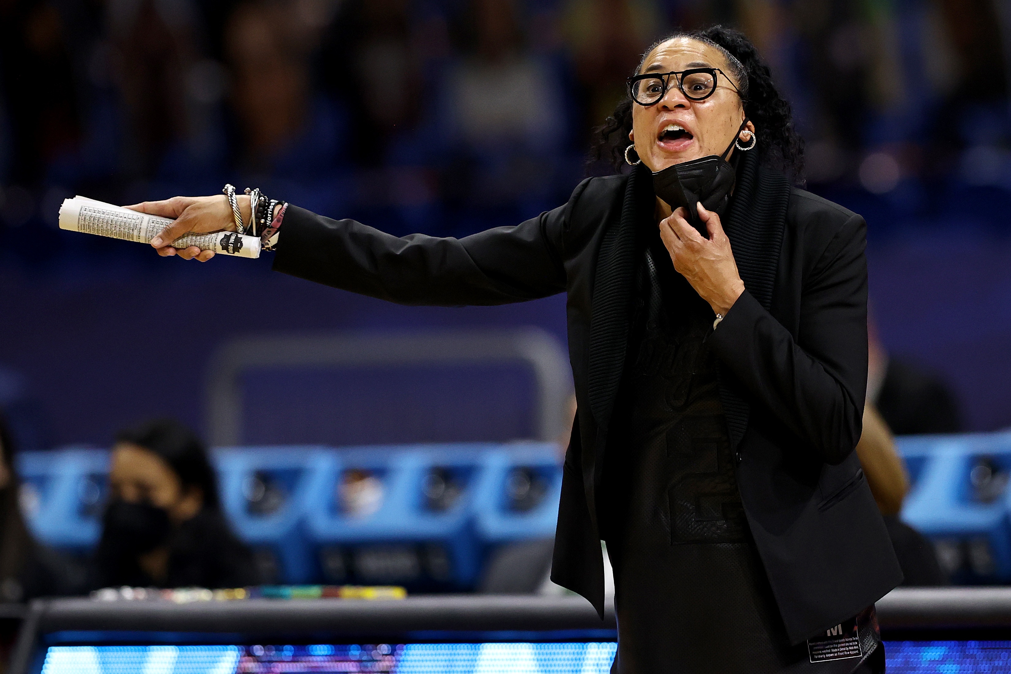 SAN ANTONIO, TEXAS - APRIL 02: Head coach Dawn Staley of the South Carolina Gamecocks calls out to players against the Stanford Cardinal during the third quarter in the Final Four semifinal game of the 2021 NCAA Women's Basketball Tournament at the Alamodome on April 02, 2021 in San Antonio, Texas. (Photo by Elsa/Getty Images)