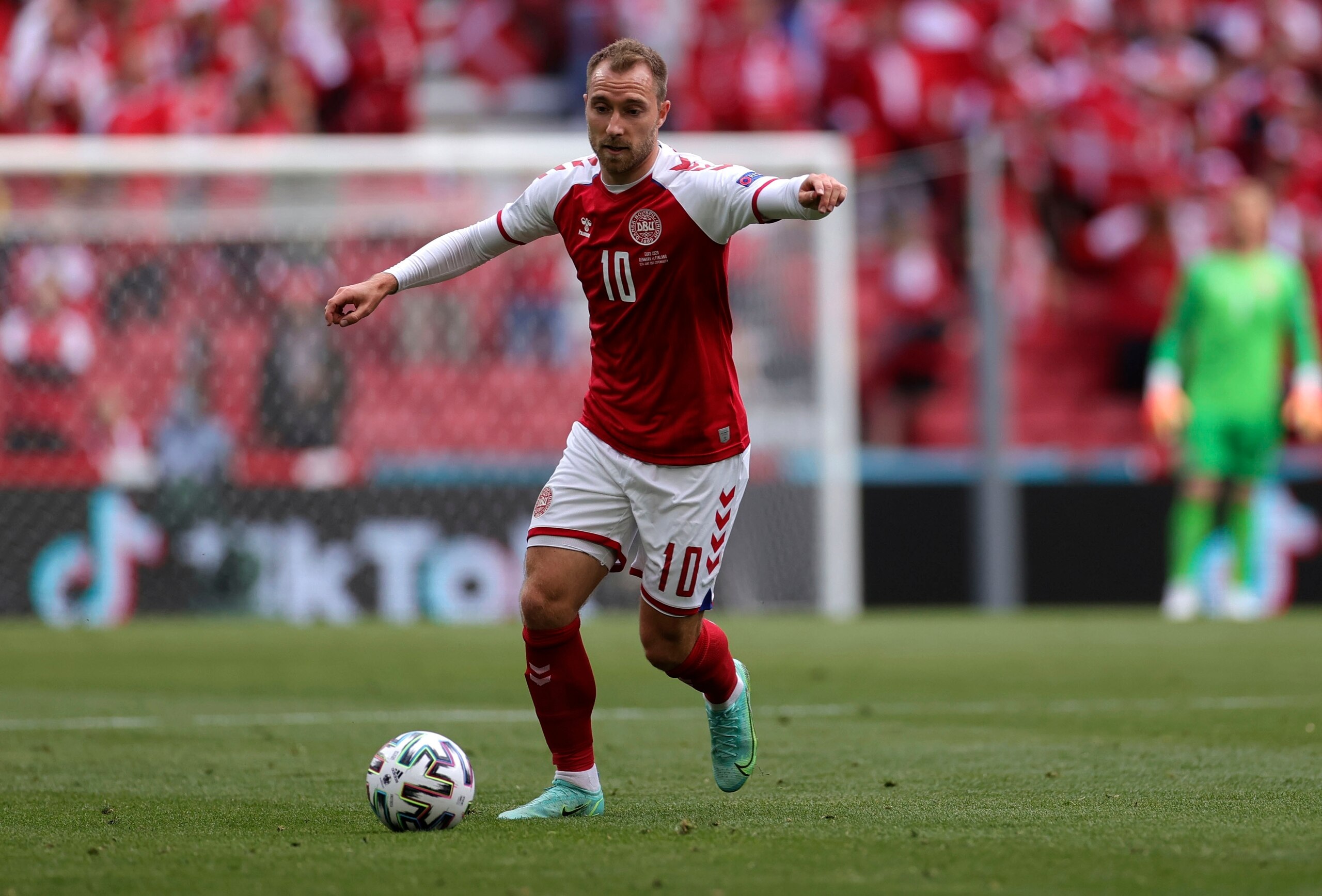 Denmark's Christian Eriksen controls the ball during the Euro 2020 soccer championship group B match between Denmark and Finland at Parken stadium in Copenhagen, Denmark, Saturday, June 12, 2021. Eriksen collapsed on the pitch and received medical assistance before being taken to hospital. (Wolfgang Rattay/Pool via AP)