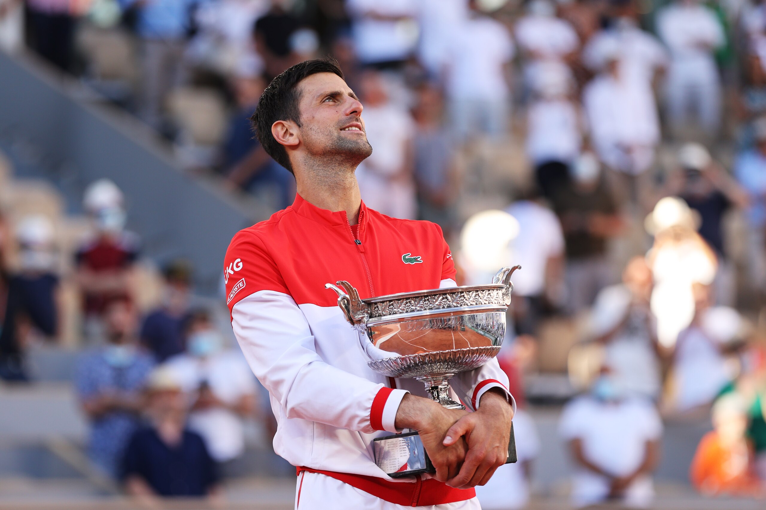 PARIS, FRANCE - JUNE 13: Novak Djokovic of Serbia celebrates as he holds the trophy after winning his Men's Singles Final match against Stefanos Tsitsipas of Greece during Day Fifteen of the 2021 French Open at Roland Garros on June 13, 2021 in Paris, France. (Photo by Clive Brunskill/Getty Images)