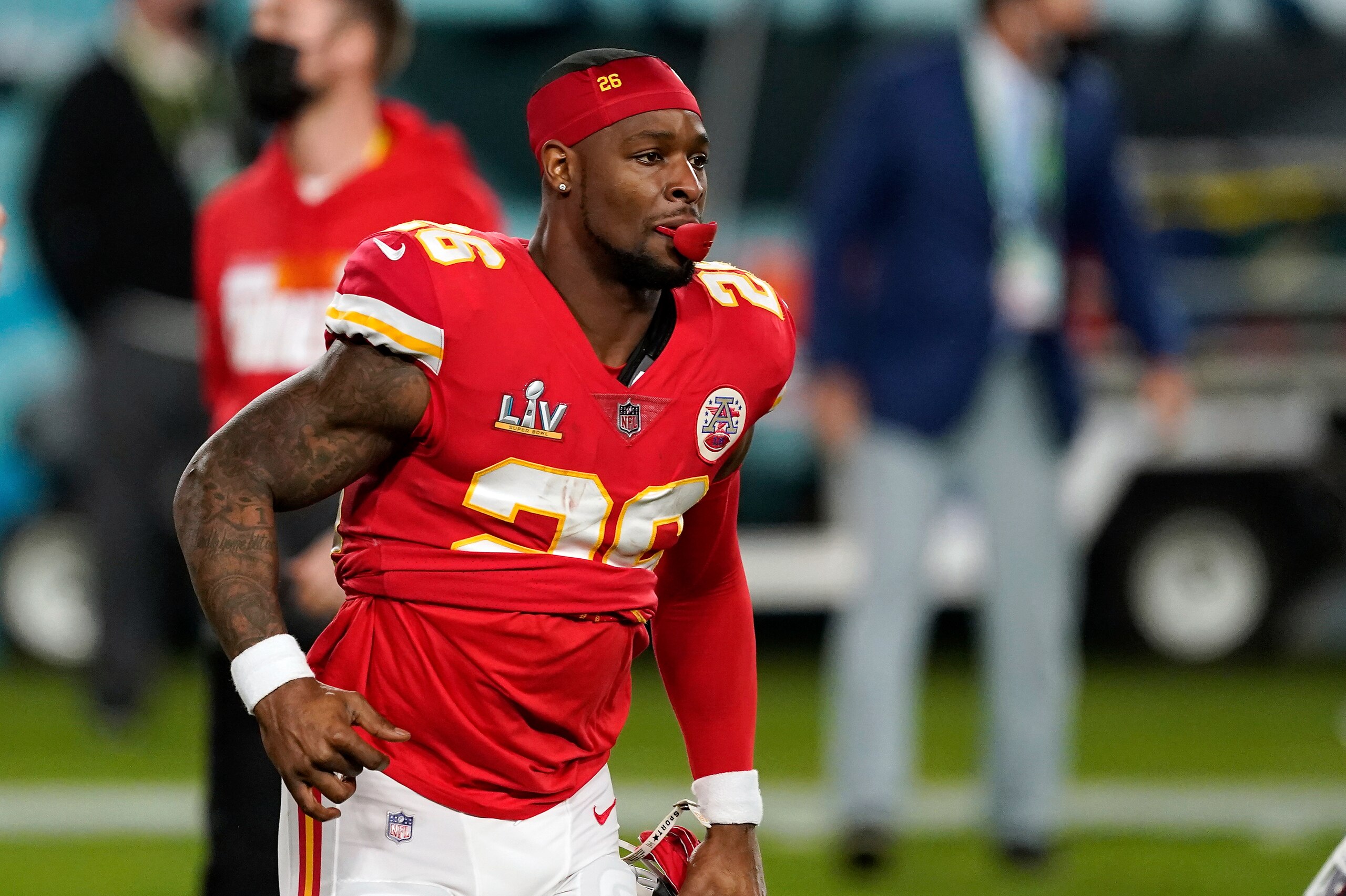 Kansas City Chiefs running back Le'Veon Bell (26) runs off the field after the NFL Super Bowl 55 football game against the Tampa Bay Buccaneers, Sunday, Feb. 7, 2021, in Tampa, Fla. The Tampa Bay Buccaneers defeated the Kansas City Chiefs 31-9. (AP Photo/Steve Luciano)
