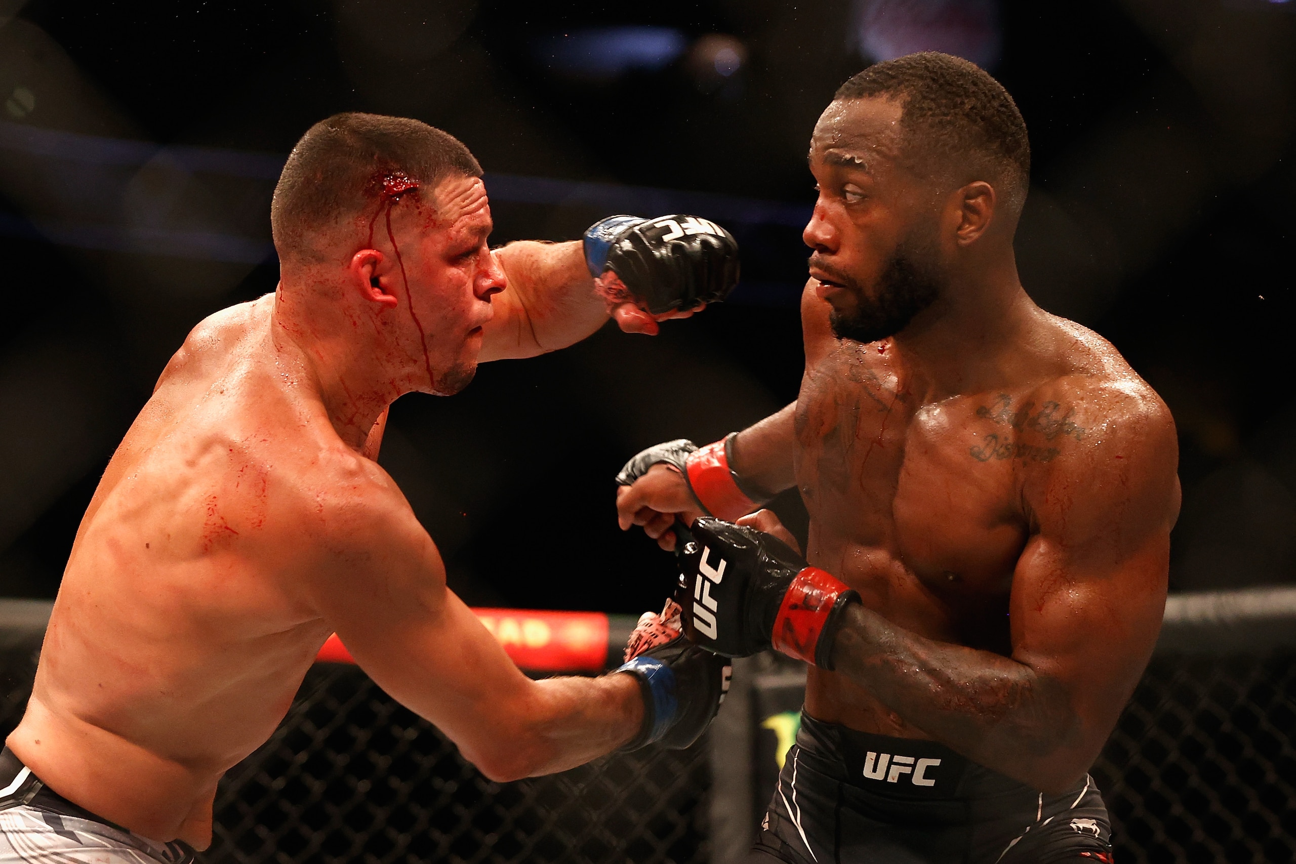 GLENDALE, ARIZONA - JUNE 12: Nate Diaz (L) fights Leon Edwards of Jamaica during their UFC 263 welterweight match at Gila River Arena on June 12, 2021 in Glendale, Arizona.
