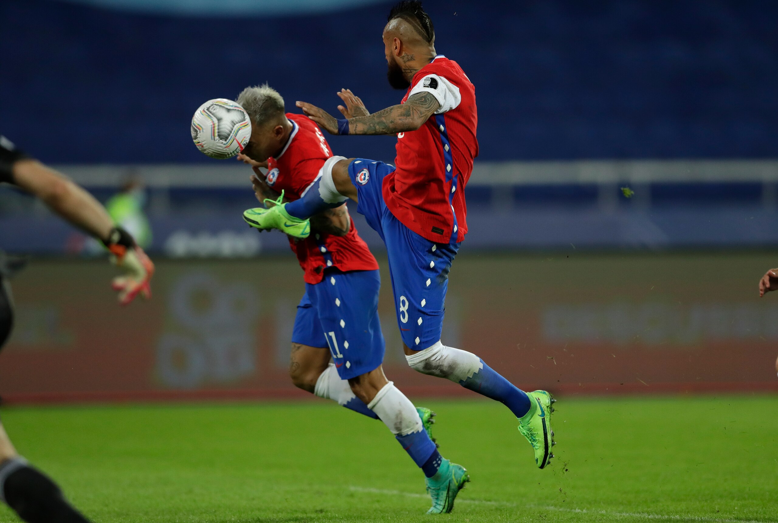 Chile's Eduardo Vargas, left, scores his side's first goal against Argentina during a Copa America soccer match at the Nilton Santos stadium in Rio de Janeiro, Brazil, Monday, June 14, 2021. (AP Photo/Silvia Izquierdo) Chile's Eduardo Vargas, left, scores his side's first goal against Argentina during a Copa America soccer match at the Nilton Santos stadium in Rio de Janeiro, Brazil, Monday, June 14, 2021. (AP Photo/Silvia Izquierdo)