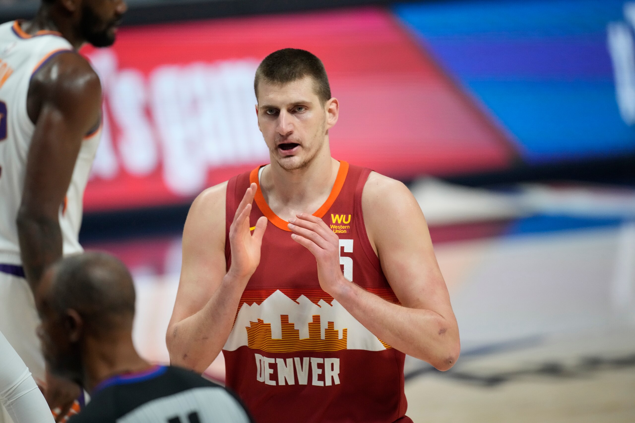 Denver Nuggets center Nikola Jokic (15) argues for a call in the first half of Game 4 of an NBA second-round playoff series Sunday, June 13, 2021, in Denver. (AP Photo/David Zalubowski) Denver Nuggets center Nikola Jokic (15) argues for a call in the first half of Game 4 of an NBA second-round playoff series Sunday, June 13, 2021, in Denver. (AP Photo/David Zalubowski)