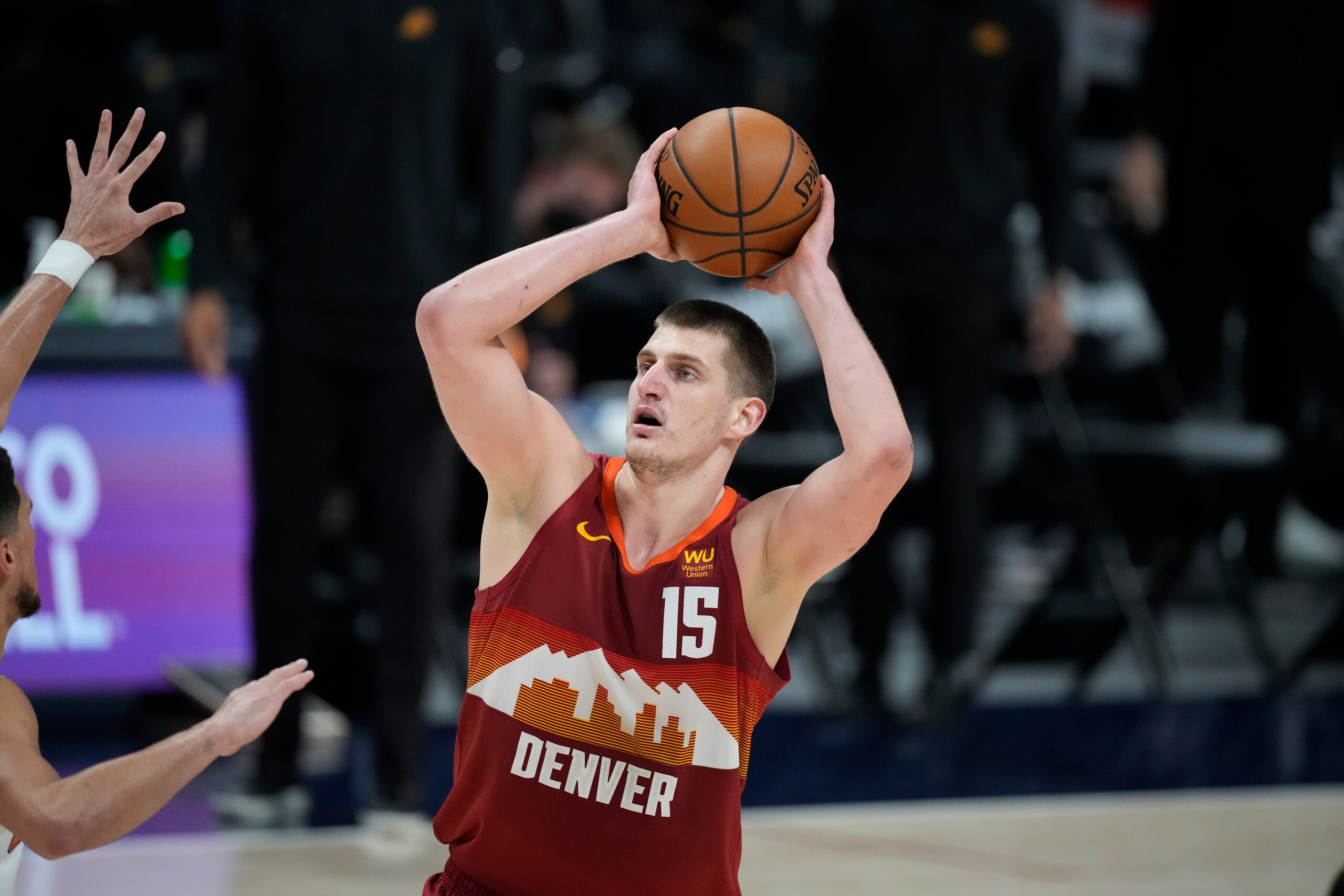 Denver Nuggets center Nikola Jokic (15) in the second half of Game 4 of an NBA second-round playoff series Sunday, June 13, 2021, in Denver. (AP Photo/David Zalubowski)