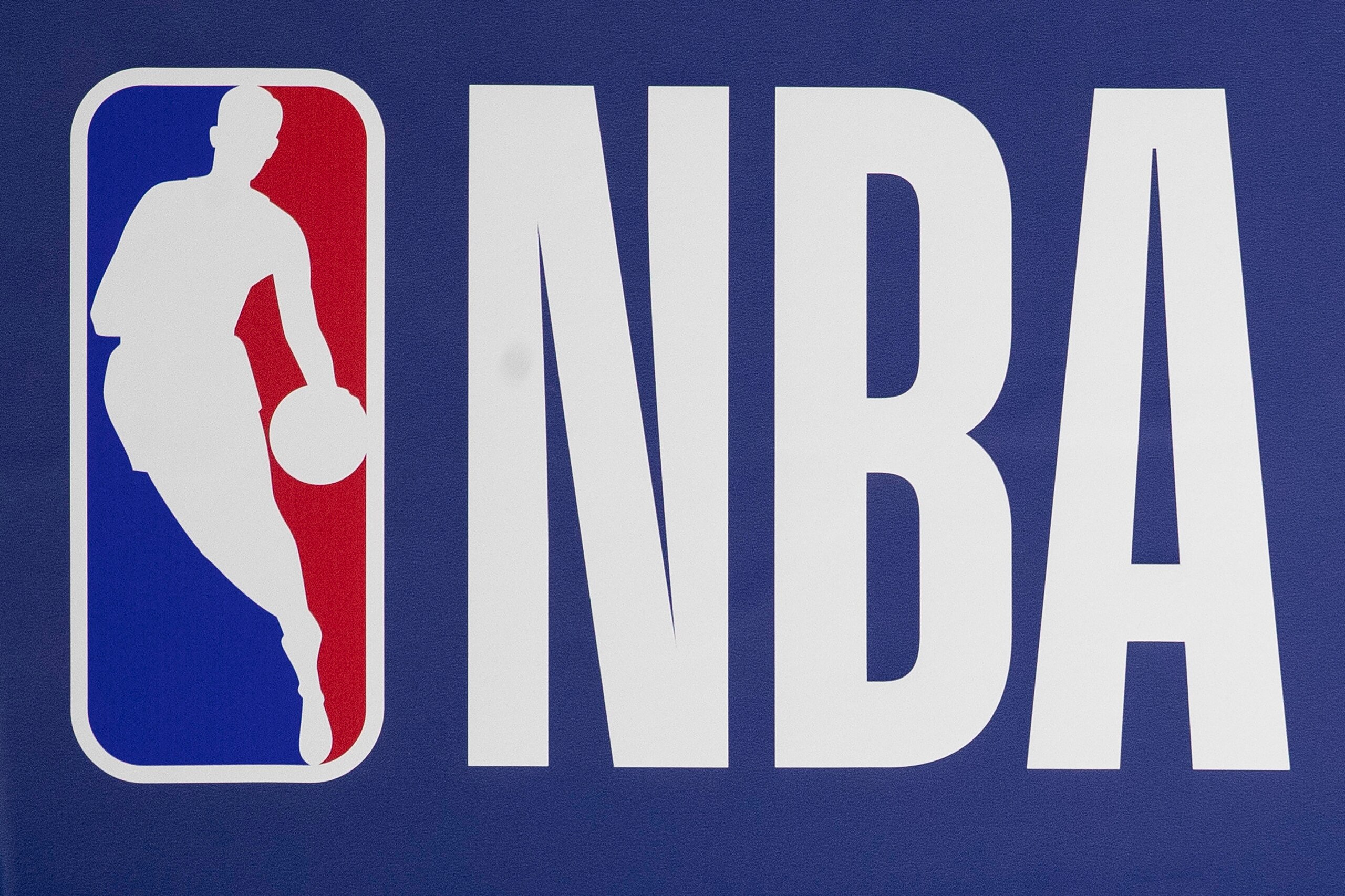 PHILADELPHIA, PA - JANUARY 20: A detailed view of the NBA logo prior to the game between the Boston Celtics and Philadelphia 76ers at the Wells Fargo Center on January 20, 2021 in Philadelphia, Pennsylvania. The 76ers defeated the Celtics 117-109. NOTE TO USER: User expressly acknowledges and agrees that, by downloading and or using this photograph, User is consenting to the terms and conditions of the Getty Images License Agreement. (Photo by Mitchell Leff/Getty Images) PHILADELPHIA, PA - JANUARY 20: A detailed view of the NBA logo prior to the game between the Boston Celtics and Philadelphia 76ers at the Wells Fargo Center on January 20, 2021 in Philadelphia, Pennsylvania. The 76ers defeated the Celtics 117-109. NOTE TO USER: User expressly acknowledges and agrees that, by downloading and or using this photograph, User is consenting to the terms and conditions of the Getty Images License Agreement. (Photo by Mitchell Leff/Getty Images)