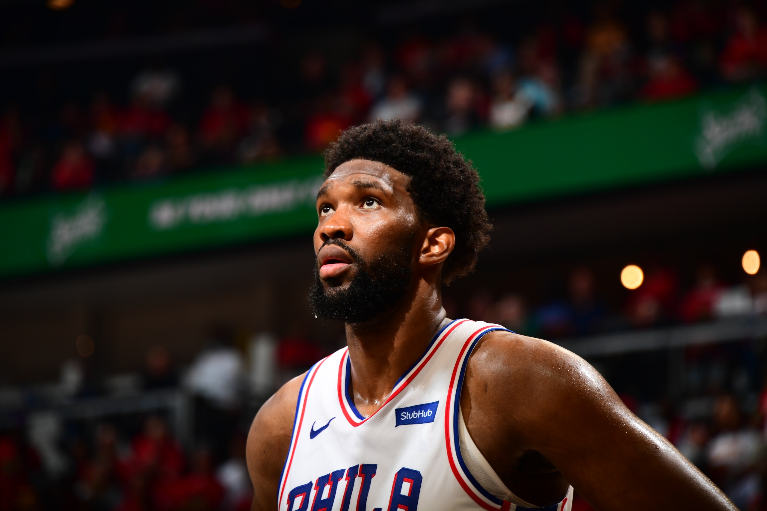 ATLANTA, GA - JUNE 14: Joel Embiid #21 of the Philadelphia 76ers looks on during Round 2, Game 4 of the 2021 NBA Playoffs on June 14, 2021 at State Farm Arena in Atlanta, Georgia.  NOTE TO USER: User expressly acknowledges and agrees that, by downloading and/or using this Photograph, user is consenting to the terms and conditions of the Getty Images License Agreement. Mandatory Copyright Notice: Copyright 2021 NBAE (Photo by Scott Cunningham/NBAE via Getty Images)