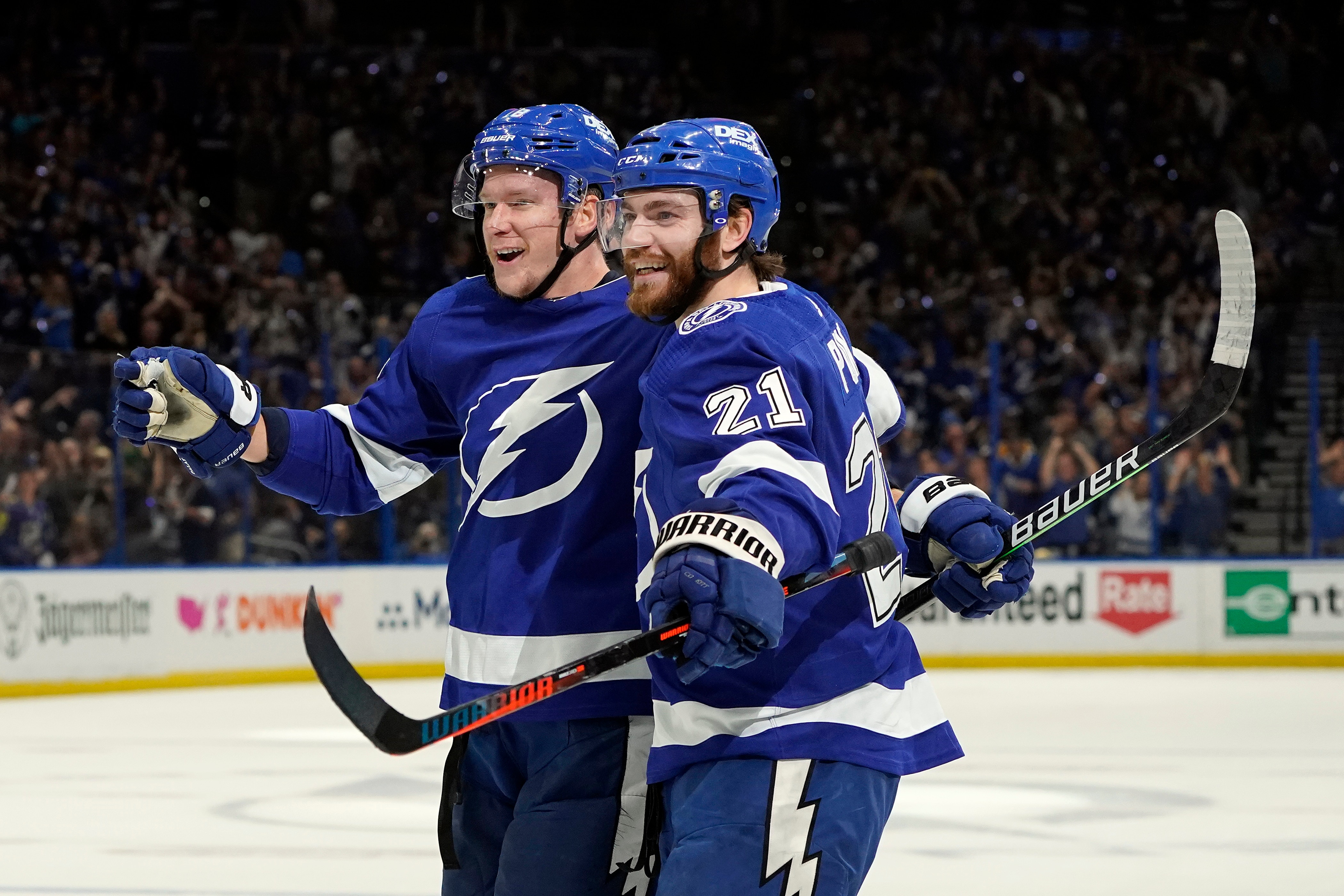 Tampa Bay Lightning left wing Ondrej Palat (18) celebrates his goal against the New York Islanders with center Brayden Point (21) during the second period in Game 2 of an NHL hockey Stanley Cup semifinal playoff series Tuesday, June 15, 2021, in Tampa, Fla. (AP Photo/Chris O'Meara)