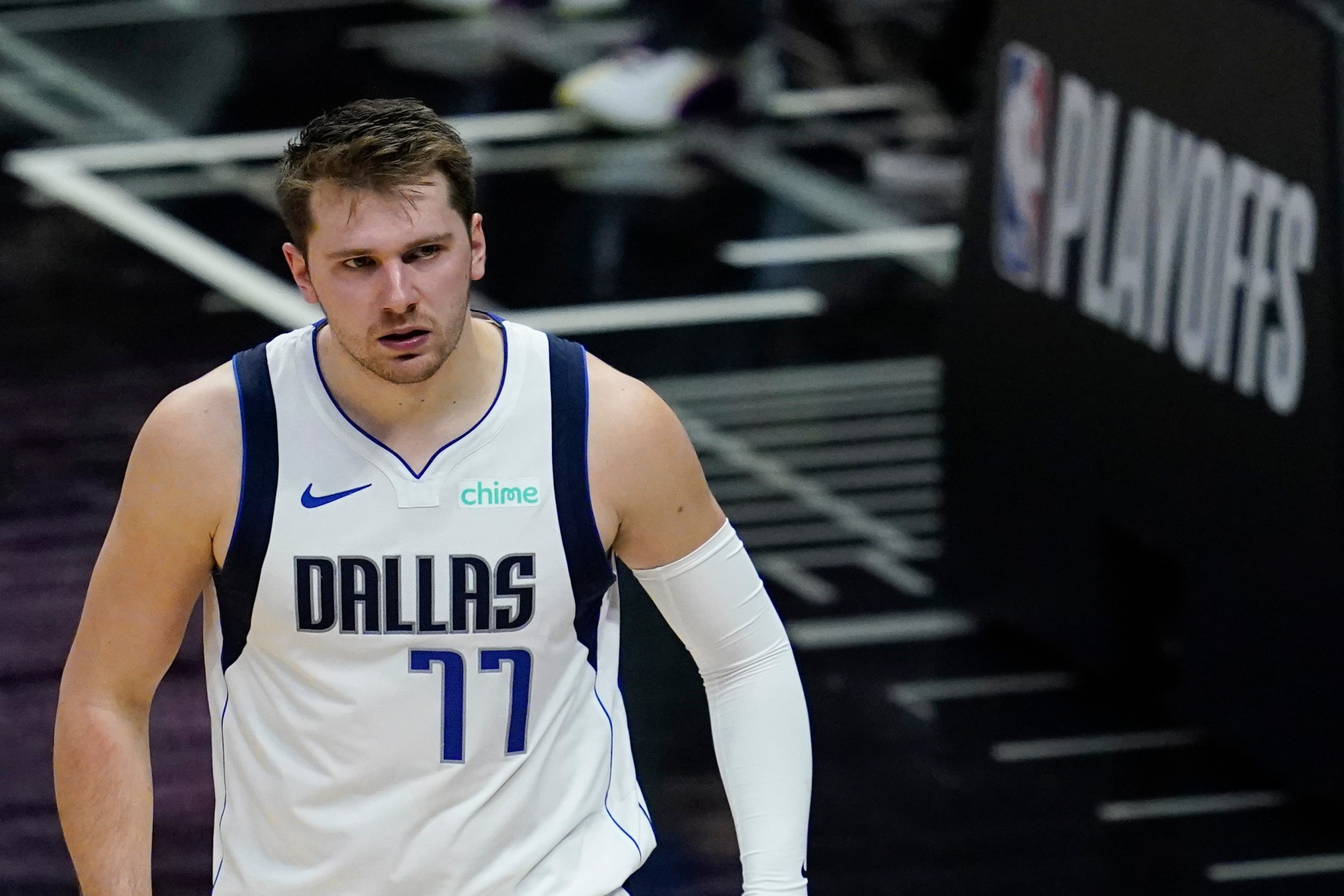 Dallas Mavericks guard Luka Doncic (77) reacts to making a shot during the second quarter of Game 7 of an NBA basketball first-round playoff series against the Los Angeles Clippers Sunday, June 6, 2021, in Los Angeles, Calif. (AP Photo/Ashley Landis)