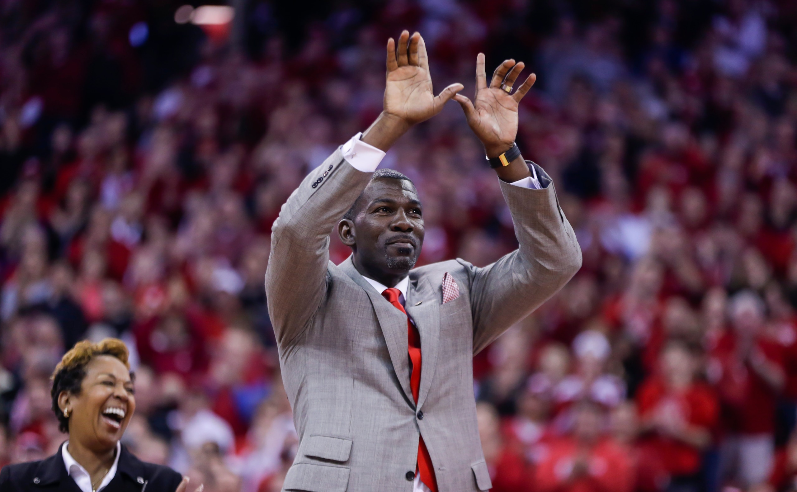 Former Wisconsin basketball player Michael Finley is honored during a timeout in an NCAA college basketball game between Wisconsin and Michigan Sunday, Feb. 28, 2016, in Madison, Wis. (AP Photo/Andy Manis)