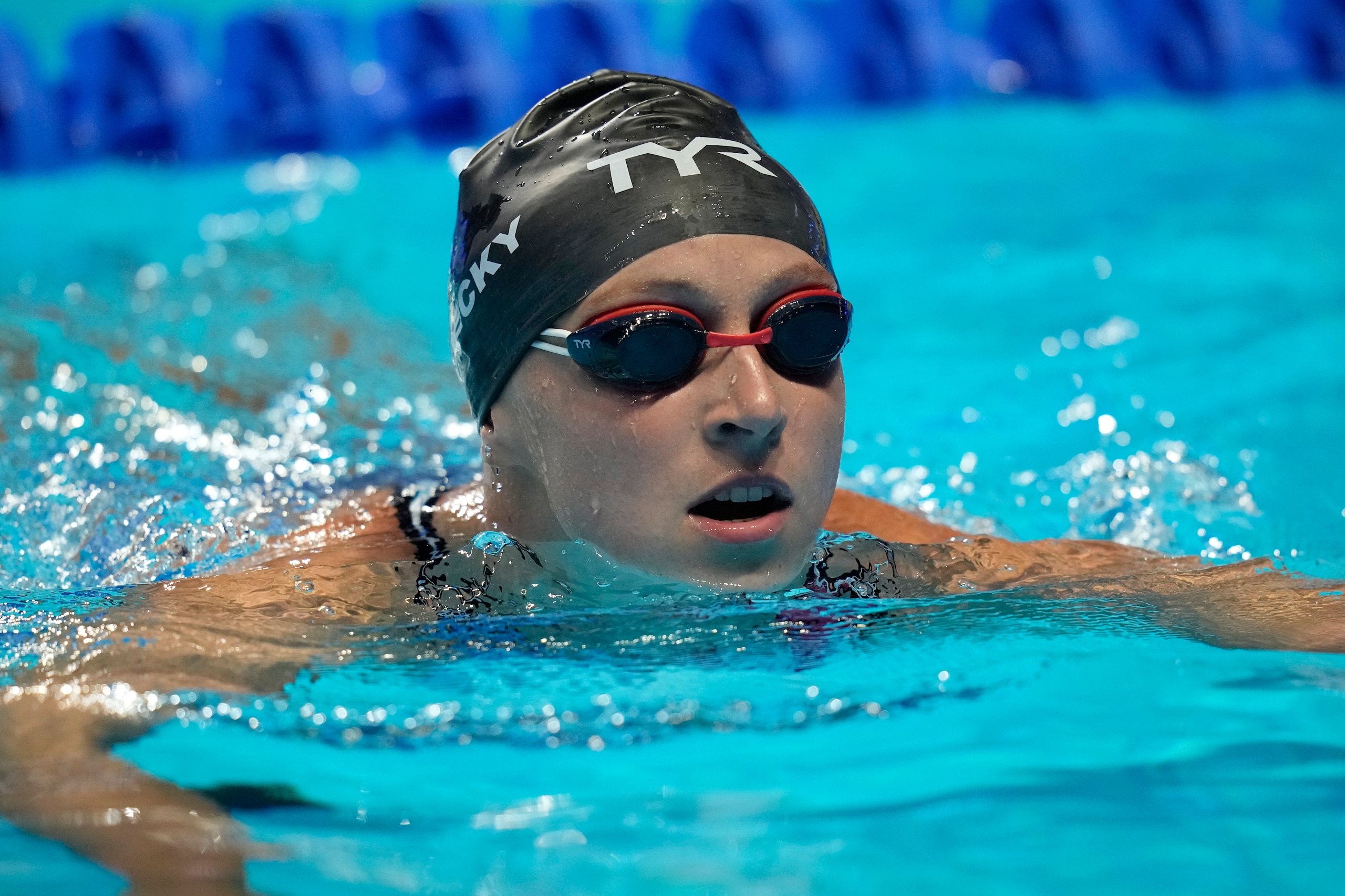 Katie Ledecky makes her way out of the pool after competing in a semifinal heat in the women's 200-meter Freestyle during wave 2 of the U.S. Olympic Swim Trials on Tuesday, June 15, 2021, in Omaha, Neb. (AP Photo/Charlie Neibergall)