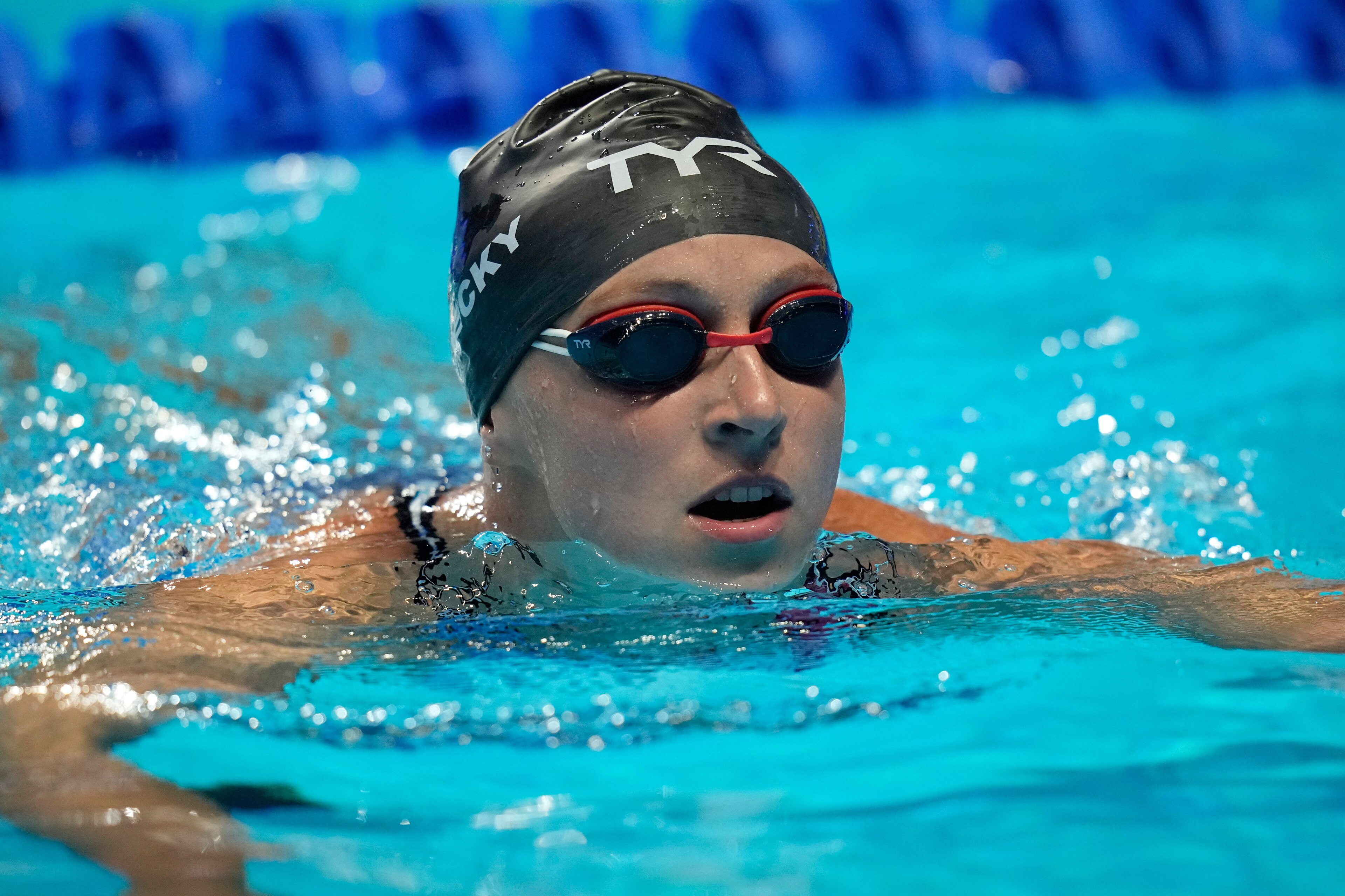 Katie Ledecky makes her way out of the pool after competing in a semifinal heat in the women's 200-meter Freestyle during wave 2 of the U.S. Olympic Swim Trials on Tuesday, June 15, 2021, in Omaha, Neb. (AP Photo/Charlie Neibergall)