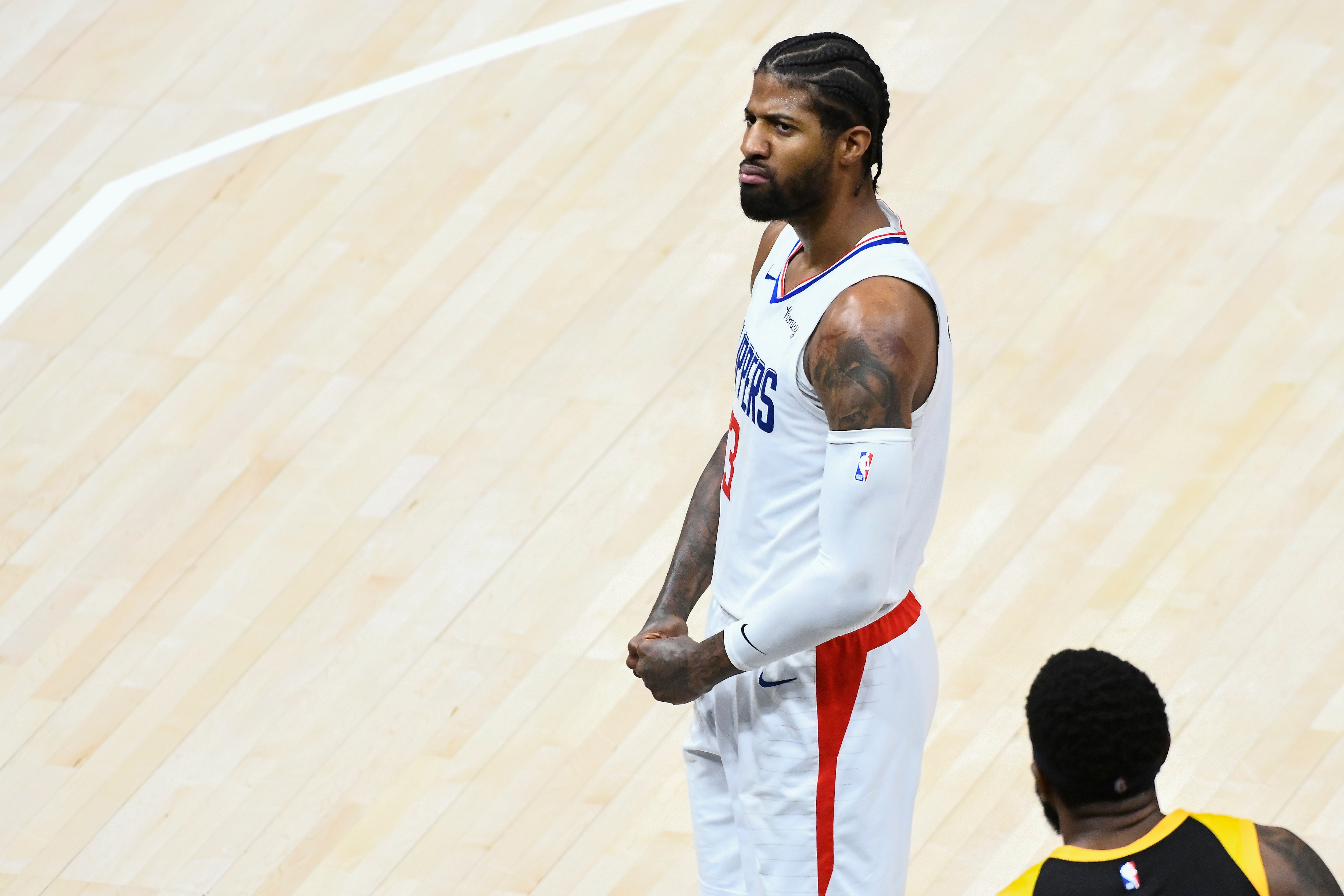 SALT LAKE CITY, UTAH - JUNE 16: Paul George #13 of the Los Angeles Clippers celebrates a basket in Game Five of the Western Conference second-round playoff series against the Utah Jazz at Vivint Smart Home Arena on June 16, 2021 in Salt Lake City, Utah. NOTE TO USER: User expressly acknowledges and agrees that, by downloading and/or using this photograph, user is consenting to the terms and conditions of the Getty Images License Agreement. (Photo by Alex Goodlett/Getty Images)