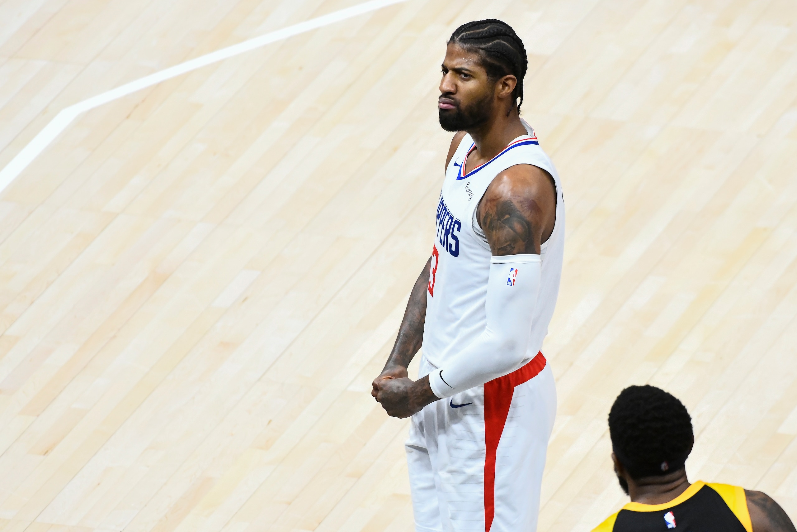 SALT LAKE CITY, UTAH - JUNE 16: Paul George #13 of the Los Angeles Clippers celebrates a basket in Game Five of the Western Conference second-round playoff series against the Utah Jazz at Vivint Smart Home Arena on June 16, 2021 in Salt Lake City, Utah. NOTE TO USER: User expressly acknowledges and agrees that, by downloading and/or using this photograph, user is consenting to the terms and conditions of the Getty Images License Agreement. (Photo by Alex Goodlett/Getty Images)