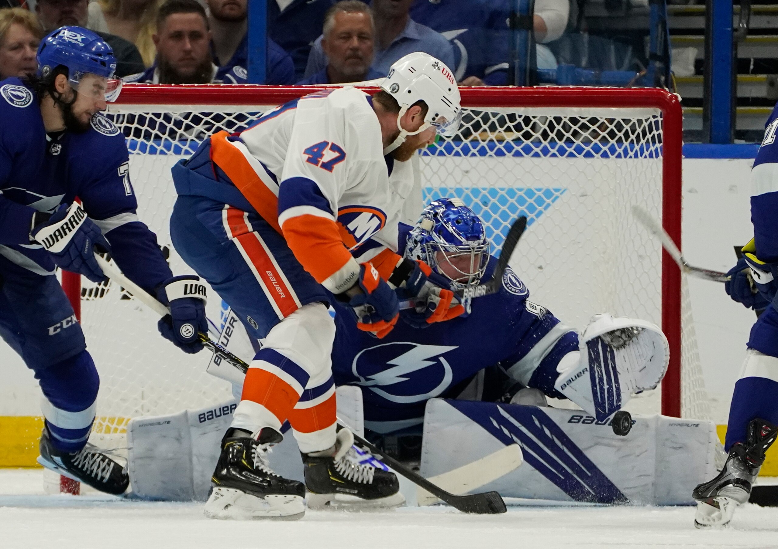 New York Islanders right wing Leo Komarov (47) shoots on Tampa Bay Lightning goaltender Andrei Vasilevskiy (88) during the second period in Game 2 of an NHL hockey Stanley Cup semifinal playoff series Tuesday, June 15, 2021, in Tampa, Fla. (AP Photo/Chris O'Meara) New York Islanders right wing Leo Komarov (47) shoots on Tampa Bay Lightning goaltender Andrei Vasilevskiy (88) during the second period in Game 2 of an NHL hockey Stanley Cup semifinal playoff series Tuesday, June 15, 2021, in Tampa, Fla. (AP Photo/Chris O'Meara)