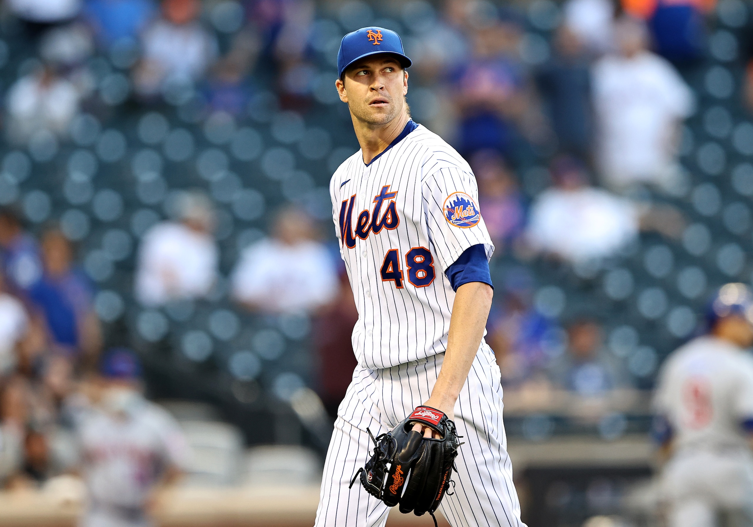 NEW YORK, NEW YORK - JUNE 16:  Jacob deGrom #48 of the New York Mets walks off the field after the first inning against the Chicago Cubs at Citi Field on June 16, 2021 in the Flushing neighborhood of the Queens borough of New York City. (Photo by Elsa/Getty Images)