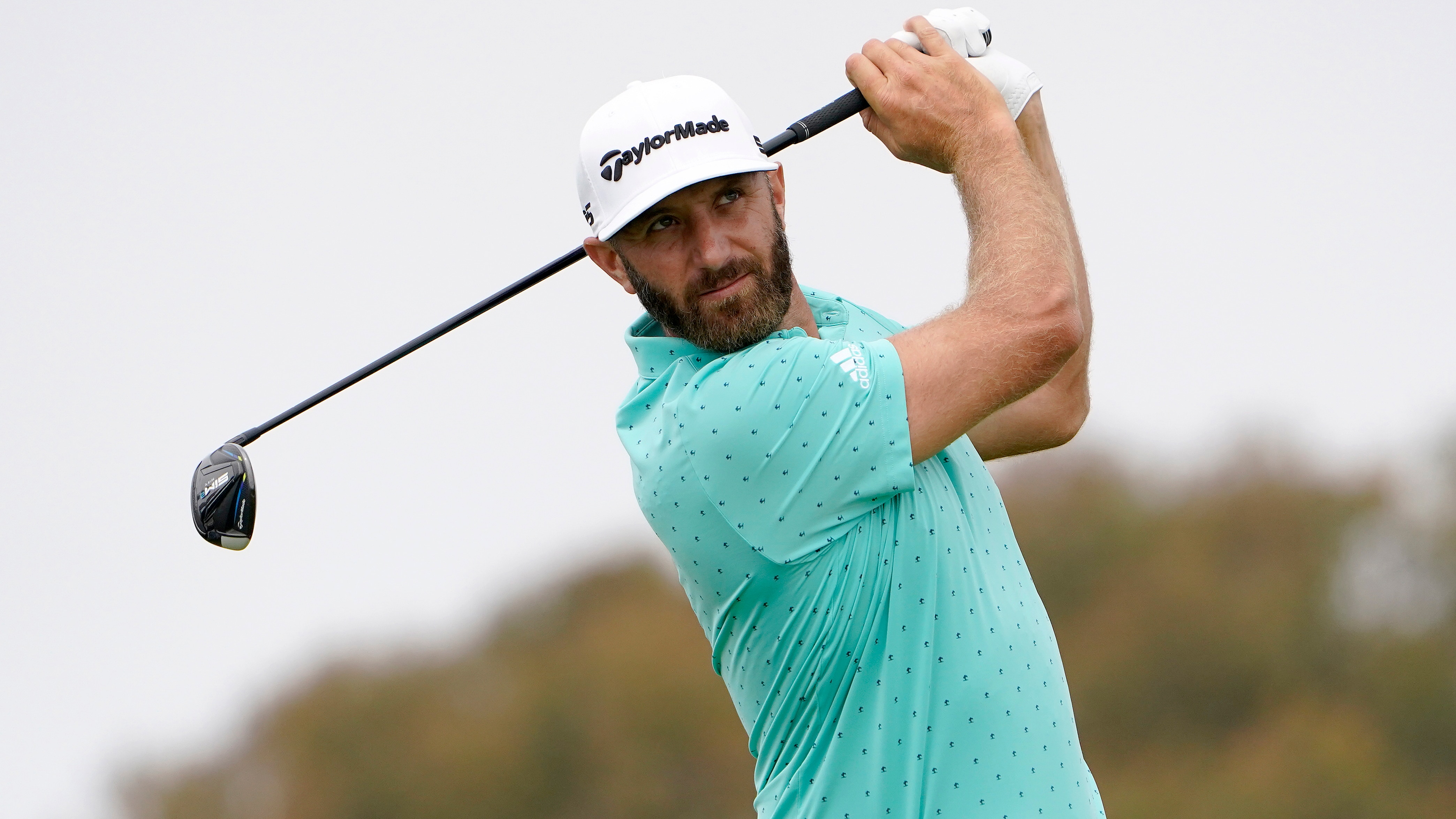Dustin Johnson plays his shot from the second tee during a practice round of the U.S. Open Golf Championship, Wednesday, June 16, 2021, at Torrey Pines Golf Course in San Diego. (AP Photo/Jae C. Hong)